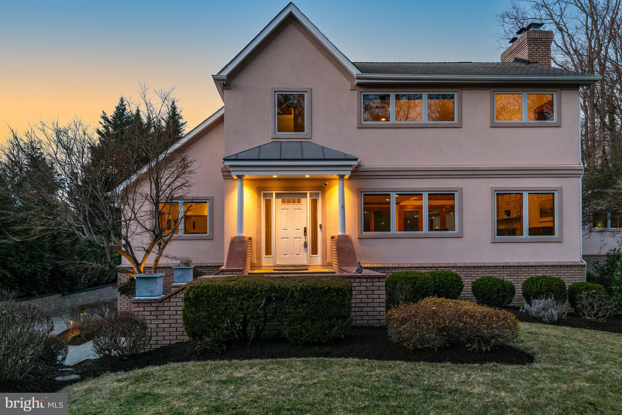 Welcome to your dream home in a calming, wooded oasis in McLean, VA! This stunning contemporary residence offers a perfect blend of luxury and unique design, nestled on a generous and flat half-acre lot.

Step inside to discover a gourmet kitchen that will inspire your culinary adventures, complete with an eat-in area and a cozy breakfast nook, perfect for casual dining. The spacious dining area is ideal for entertaining, while the two fireplaces create a warm and inviting ambiance throughout the home. A striking loft overlooks the main living area, adding an architectural highlight that enhances the home's open and airy feel.

With five well-appointed bedrooms and four and a half bathrooms, this home offers ample space for comfort and privacy. The first-floor primary suite serves as a private retreat, featuring a spa-like bathroom and a private deck overlooking the backyard, designed for ultimate relaxation. Above the garage, a private suite provides additional living space with endless possibilities.

Enjoy movie nights in your very own home theater, which conveys with the property. The fully finished walkout basement adds even more living, sleeping, and office space, making this home as functional as it is beautiful.

Step outside and experience a backyard paradise! The fully fenced backyard is perfect for pets, while the beautifully landscaped yard features a lounge area with rocking chairs and a space for your very own tiki bar—an entertainer’s dream.

A paved driveway leads to a detached two-car garage, ensuring plenty of parking for you and your guests. Situated in McLean, this home offers the perfect balance of privacy and convenience, just minutes from the DC line and Tysons—a commuter’s dream. The power and utility lines were also recently placed underground in the neighborhood. 

This property is not just a house; it’s a home where memories are made. Don’t miss the opportunity to make this inviting 5-bedroom residence your own! Schedule a tour today and experience the warmth and charm that awaits you.