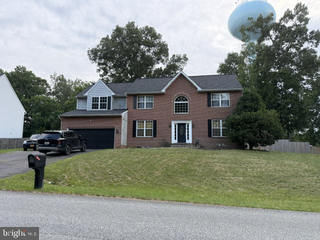 FULLY AVAILABLE! ATTRACTIVE COLONIAL WITH IMPRESSIVE 2 STORY FOYER IN QUIET NEIGHBORHOOD. LG KITCHEN W/ISLAND, OAK CABINETS, STAINLESS STEEL APPLIANCES & DECORATIVE LIGHTING ADJACENT TO FR W/FP. WOOD FLOORS & W/W CARPET. HUGE MBR W/SITTING ROOM. FINISHED BASEMENT. HUGE BACKYARD. PLENTY OF SPACE TO PLAY AND ENTERTAIN.