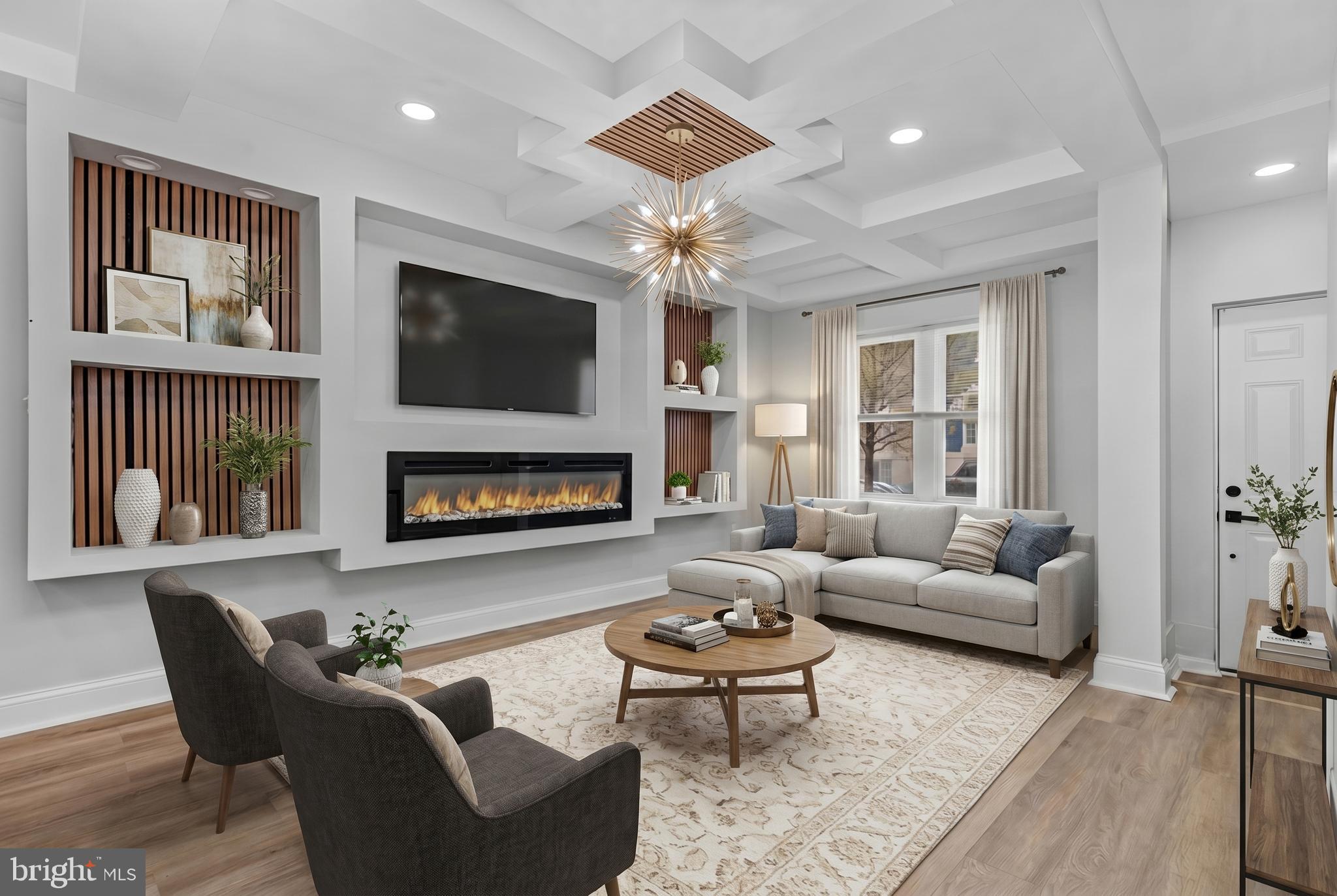 Welcome to 441 N Lakewood—fully renovated with a clean, modern aesthetic and warm, upscale finishes throughout. Honey-toned LVP floors span the main level, anchored by a statement fireplace with custom wood paneling and tray ceilings, all complemented by sleek brushed gold lighting.

The kitchen is crisp and contemporary with quartz countertops, stainless steel appliances, and pendant lighting, flowing seamlessly into expansive living and dining spaces designed for both everyday living and entertaining.

Upstairs offers three well-sized bedrooms and two full baths, including a standout primary suite with beautiful tilework and refined vanities.

The finished lower level adds versatility with a fourth bedroom, full bath, and flexible space for an office, rec room, or guest suite.

Fenced rear yard and a wide street with convenient perpendicular parking complete the package.

Ideally located just minutes from Johns Hopkins, Patterson Park, Canton, and Fells Point, with easy access to I-95, I-895, and downtown Baltimore—perfect for commuting, dining, and enjoying everything the city has to offer.
