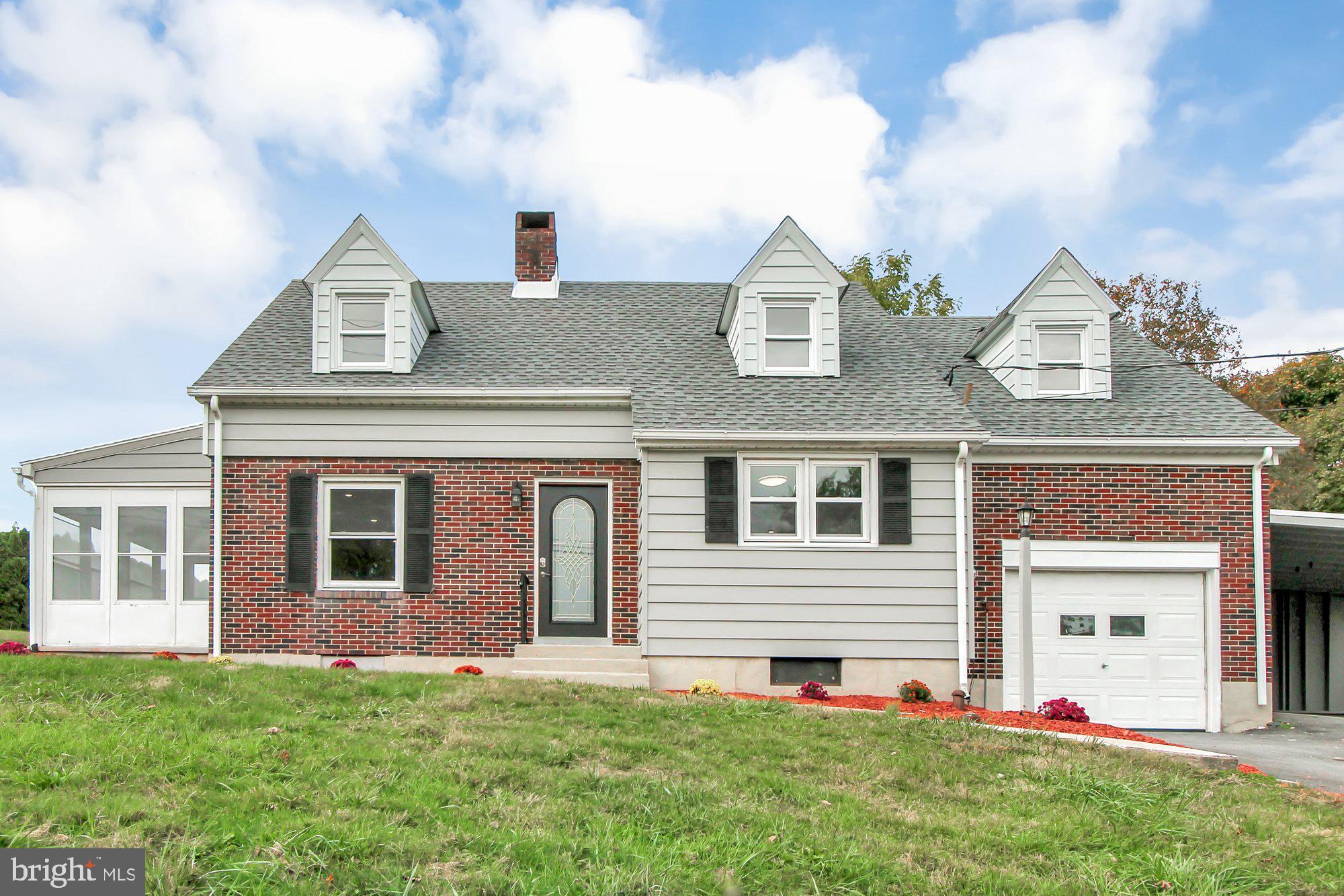 Welcome to 1663 Old Lancaster Pike located in Governor Mifflin School District! This completely renovated brick cape is situated on a large .45 acre and has plenty of living space! As you enter you will be immediately impressed by the large living/family room with gorgeous newly-stained hardwood floors, recessed lighting, and white brick fireplace. Off the family room is a screened-in porch perfect for those summer nights. To the right is the beautifully updated kitchen with all new stainless-steel appliances, modern white cabinetry, tiled backsplash, and sleek black granite countertops. The kitchen opens up to a large dining room that is perfect for gatherings. Off the kitchen you will find the attached oversized one-car garage with epoxy floors and access to the basement. Upstairs you will love the three sizable bedrooms, all with hardwood floors, and the newly remodeled full bath with a new vanity and LED Mirror light, new toilet, and new on-trend Mosaic tile flooring! Heading down to the finished basement you will find yet another living area with new paint, vinyl flooring, and a second wood-burning fireplace. All of this AND this home also has: a heated driveway, brand new HVAC system, new roof (2019), new windows throughout the main floor and garage, new plumbing, new electrical, and new exterior paint on the siding, shed, and carport! So call today for your private showing, you will not be disappointed!