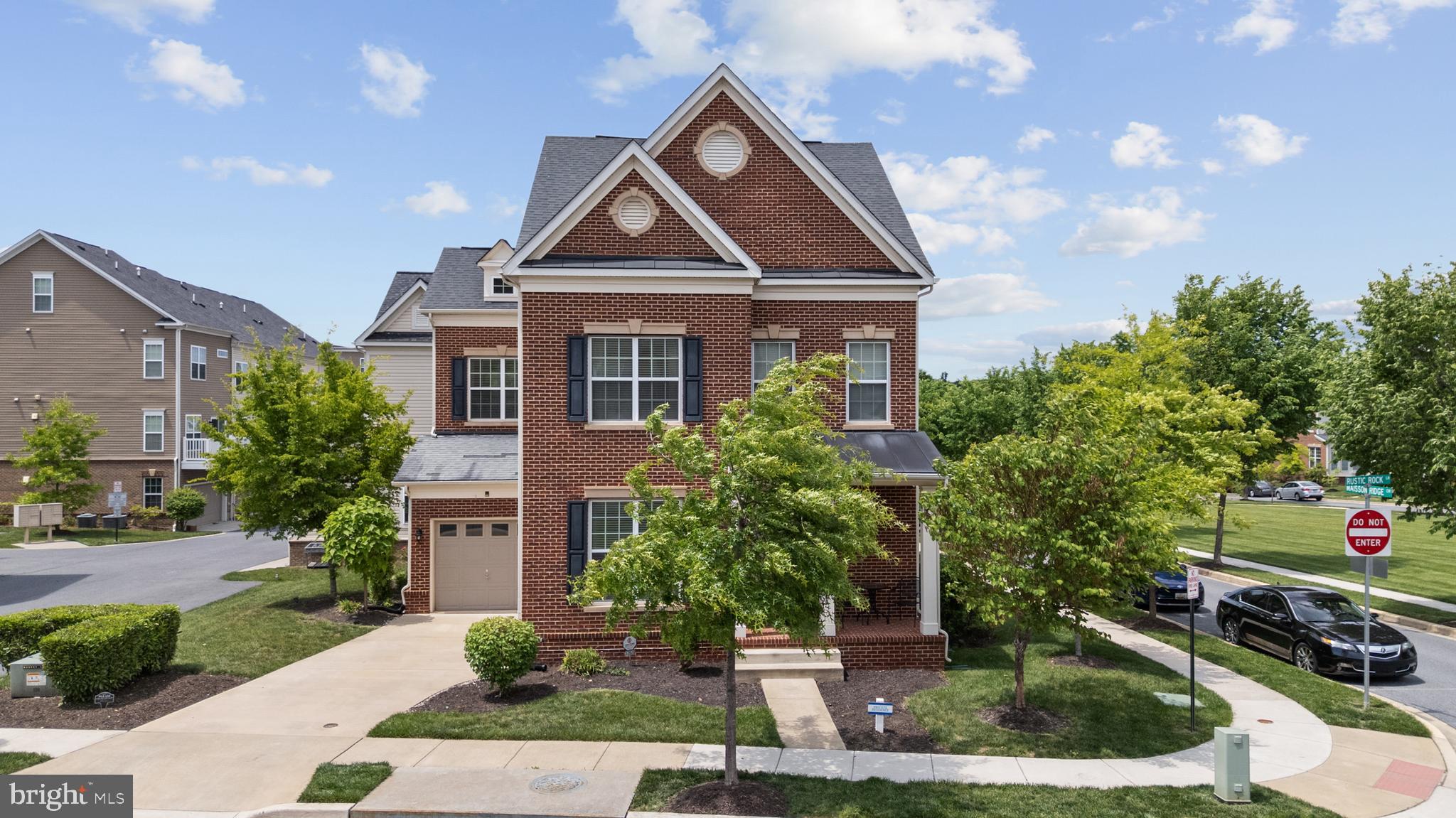 Welcome to 12620 Rustic Rock Lane, the former model home, and it shows. With over 3,500 sq. ft. of beautifully finished living space, this 4-bedroom, 3.5-bath stunner is packed with the upgrades and thoughtful details that make a house feel like home from the moment you walk in.  The main level is designed to impress and to live in, hardwood floors throughout, formal living and dining rooms, a family room anchored by a cozy gas fireplace, a powder room, a pantry, and a gourmet kitchen that checks every box: granite countertops, stainless steel appliances, double ovens, and cabinet space to spare.

Upstairs, the expansive owner's suite is your personal retreat, featuring a stunning tray ceiling, two walk-in closets, and a spa-inspired bath complete with dual vanities, a soaking tub, and a walk-in shower.  The fully finished basement adds even more to love, a full bathroom, a dedicated movie room, a spacious utility room, and an oversized rec room with plenty of storage for everything you need to tuck away.  Outside, pull right into your front-load one-car garage or take advantage of the oversized driveway with plenty of space for everyone.

And the community delivers. Enjoy an outdoor pool, clubhouse with fitness center, two playgrounds, pocket parks, walking trails, and scenic ponds all within your own neighborhood.

Location-wise, you're just a couple of short blocks from the Muirkirk MARC station, with easy access to the Greenbelt Metro, I-95, ICC (The new build out of Konterra) , and US-1. Shopping and dining at Laurel Town Center and recreation at the Fairland Sports and Aquatics Complex are right around the corner.  This one was built to be the best in the community and it still is.