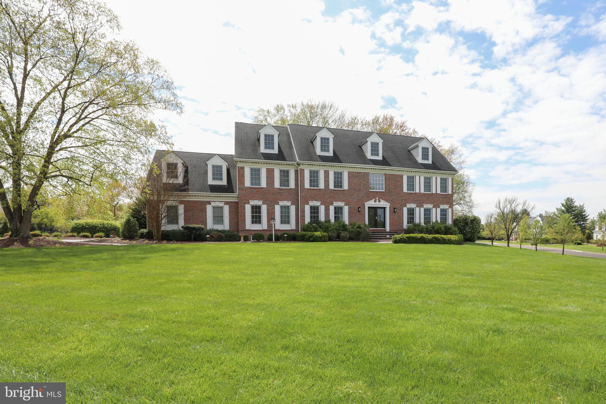 Wonderful opportunity to move into sought after Hidden Lake Estates in Newtown, PA. This 5 bedroom, 5 full and 3 half bath brick colonial features a grand two story foyer entrance with turned staircase, hardwood flooring and crown molding. A large living room & dining room with hardwood floors flank the main entrance. Perhaps the most enjoyed areas of any home are the kitchen and great room. Without exception, 4 Bayshore Drive offers plenty of memorable moments. The gourmet kitchen features center island with granite countertops and adjoining breakfast area. This all opens to the great room with gas fireplace and wet bar which is great for entertaining! You can work from home in the 1st floor study with french doors and another door leading to a private deck. Two powder rooms and large laundry room complete the first level. Upstairs is the primary bedroom suite with custom bathroom, sitting room with private deck & large walk-in closets. Bedrooms 2, 3 & 4 are located on the second level and are all have their own full bathrooms with the additional 5th bedroom with full bathroom occupying the entire third floor. Below is the finished basement with built-in bar for entertainment, exercise room, game room, media area and another powder room. Outside is paradise! Beautiful inground pool, patio, oversized deck and two private decks offer tranquil views over an acre of fenced-in property all while you enjoy your morning cup of coffee! Other highlights include an oversize 3 car garage and one of the most convenient locations in Newtown. You are just 5 minutes to schools, grocery shopping, restaurants, Tyler State Park and historic Newtown Borough! Easy access to I95, all points in NJ including the Princeton Route 1 corridor, train stations and airports. Award winning Council Rock School District. Don't miss out on this incredible property. Add your own touches and updating. It's just what you have been waiting for!