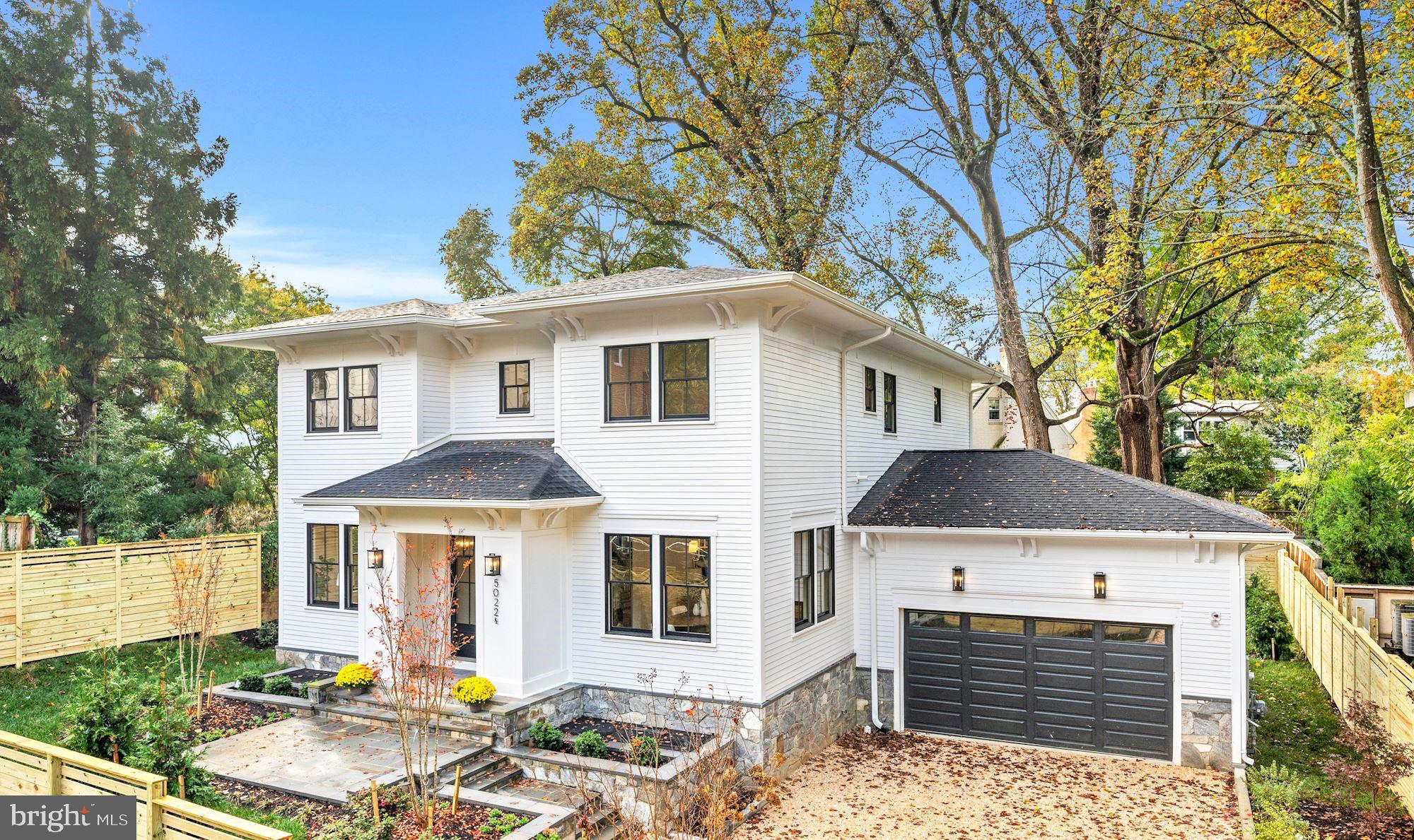 NEW PRICE! GREAT VALUE!  NEW CONSTRUCTION nestled among mature trees and set privately off the street, this home is the ultimate in sophisticated city living. Located in  sought after Kent, it boasts a bright open four square floor plan w/10ft ceilings on main level, elegant living and dining rooms.  A chef inspired kitchen with luxury appliances.  The butlers pantry has an additional dishwasher.  A large waterfall kitchen island opens to a light-filled family room with gas fireplace. In addition, the mudroom consists of a work space, pantry closet, coat closet and cubbies.  French doors span the rear of the home with easy access to the expansive outdoor patio and large backyard.  The second level includes a primary suite with large shower, free standing soaking tub and walk-in closet, three additional bedrooms and a dedicated laundry room. The fully finished lower level offers a light filled expansive recreation space, 9ft ceilings, 2 bedrooms and bathroom, wet-bar with beverage fridge and access to the backyard. The large outdoor patio offers a perfect space for entertaining and relaxation.  Attached TWO car garage with plug ready car charging.  Storage space galore. On a quarter of an acre (10,455 sq ft). Mins to Georgetown, VA & MD.  Walk to restaurants stores etc.