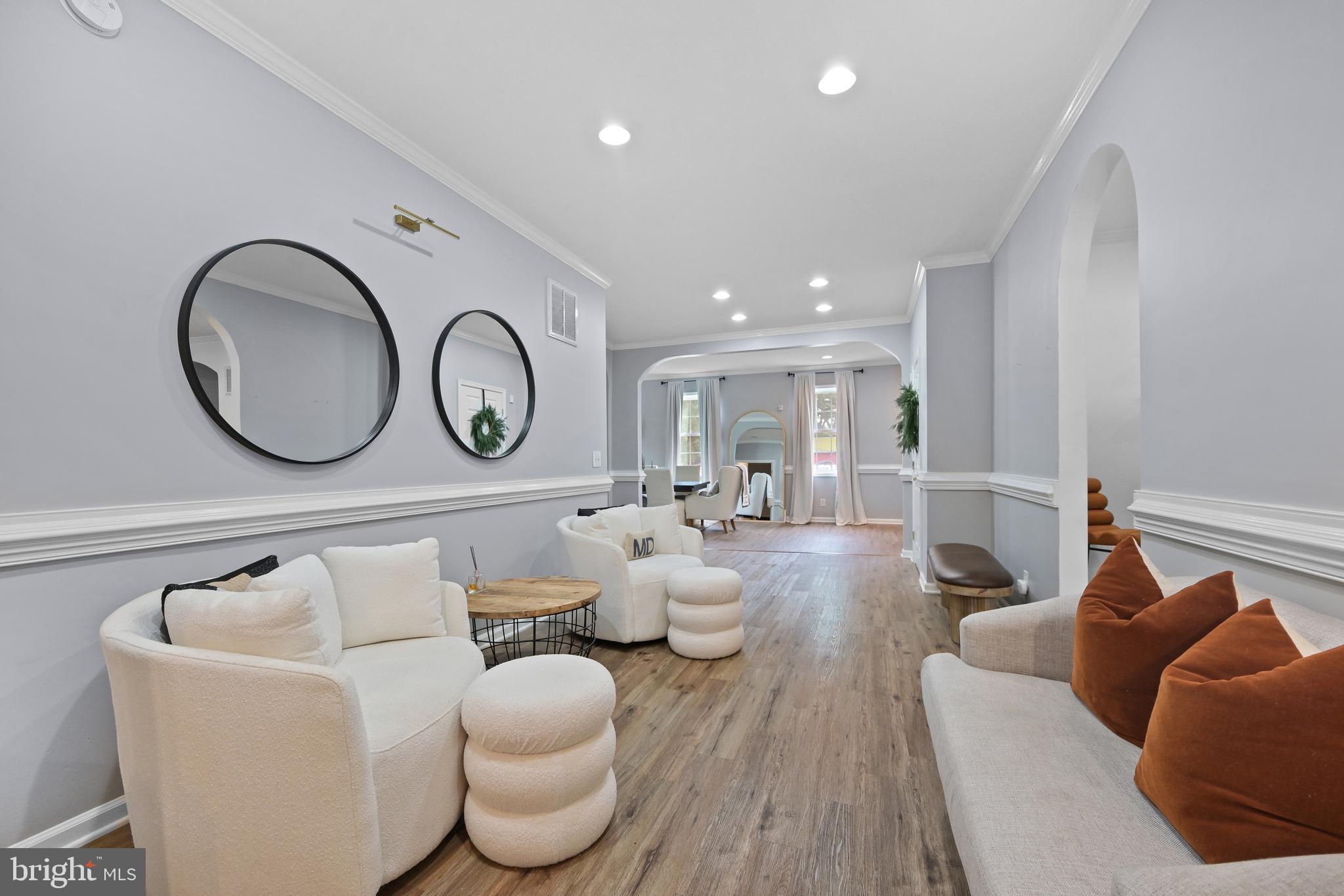 Welcome to this spacious 6-bedroom, 4.5-bathroom home in Delmar, DE, offering approximately 4,300 square feet of living space and room for everyone to spread out. Step inside to find a well-designed floor plan featuring a formal dining room and a large living room highlighted by a brick fireplace. The oversized kitchen is the heart of the home, complete with ample cabinet space, a large center island, granite countertops, tile backsplash, stainless steel appliances, cooktop, wall ovens, and a sliding glass door leading to the covered rear porch. The first floor features a primary suite, along with three additional bedrooms that share a full bathroom, plus a convenient half bath for guests. Upstairs, you'll find a second expansive primary suite with a walk-in tile shower, as well as an additional bedroom with its own full bathroom, providing excellent space for extended family, guests, or multi-generational living. Enjoy outdoor living from the covered porch overlooking the paver patio and impressive stone outdoor fireplace, creating the perfect setting for entertaining or relaxing year-round. Additional highlights include a paved driveway and an oversized pole building with two garage doors, offering exceptional storage, workshop space, or room for hobbies and equipment. This property combines generous living space, functional amenities, and outdoor features in a desirable Delmar location.