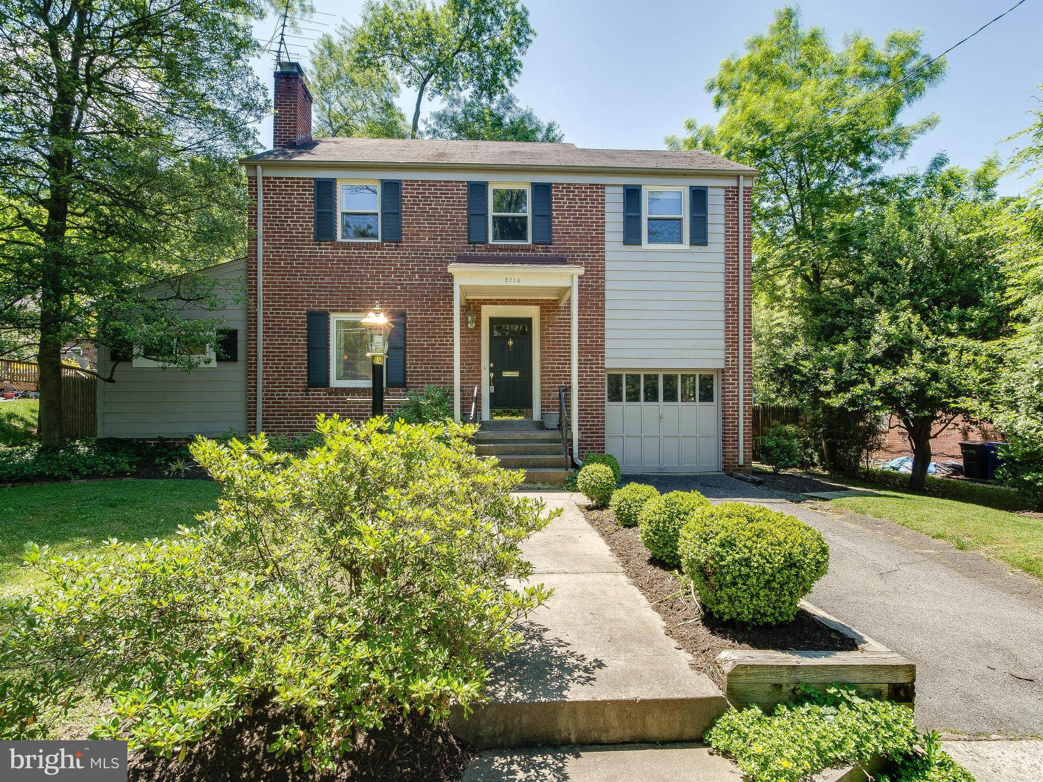 Brick Colonial in Chevy Chase featuring 3 large bedrooms  upstairs with hardwood floors throughout. Main level with sunroom/office. Kitchen features marble counters with eat in breakfast area. Large rear deck perfect for entertaining. Fenced private rear yard with beautiful landscaping. Brick Fireplace and 1 car garage. SOLD STRICTLY AS-IS.