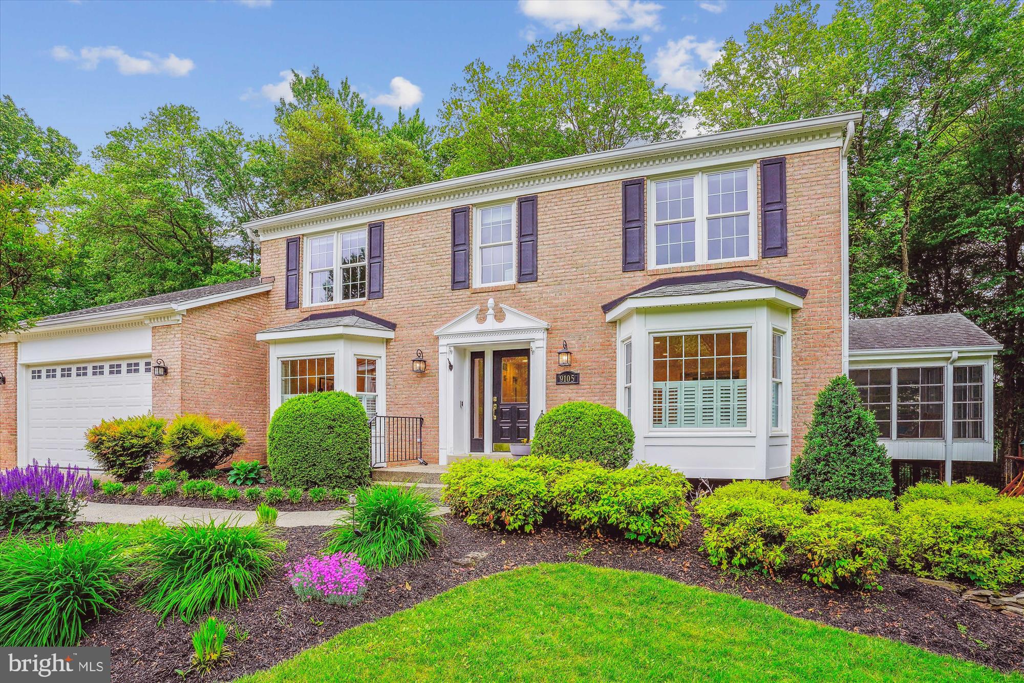 A true gem! Almost 5000 square foot colonial beautifully sited on a large lot and cul de sac in Wexford South! Exceptional floor plan with ideal flow - perfect for everyday living, family gatherings and entertaining. The main level features a large family room with gas fireplace, wet bar with wine refrigerator which opens to the white kitchen with butler's pantry, den/home office, living and dining rooms and a lovely sunroom overlooking the private yard. The upper level consists of a spacious primary suite with sitting room and excellent closet space plus 3 additional large bedrooms, hall bath and laundry room. The expansive walk out finished lower level with gas fireplace includes a 5th bedroom, full bath, work out room, wet bar with refrigerator and a storage room. Hardwood floors throughout the main and upper levels. The garage has been outfitted with epoxy flooring and a motorized storage lift! To complete the package, the backyard features a large deck, patio, hot tub, fruit trees and raised garden beds for vegetables, flowers and herbs. BONUS: Peleton bike, outdoor children's playset, hot tub, gas grill and all TV's convey! Moments to  the heart of Vienna, Foxstone Park and Cardinal Hill Swim and Racquet Club.