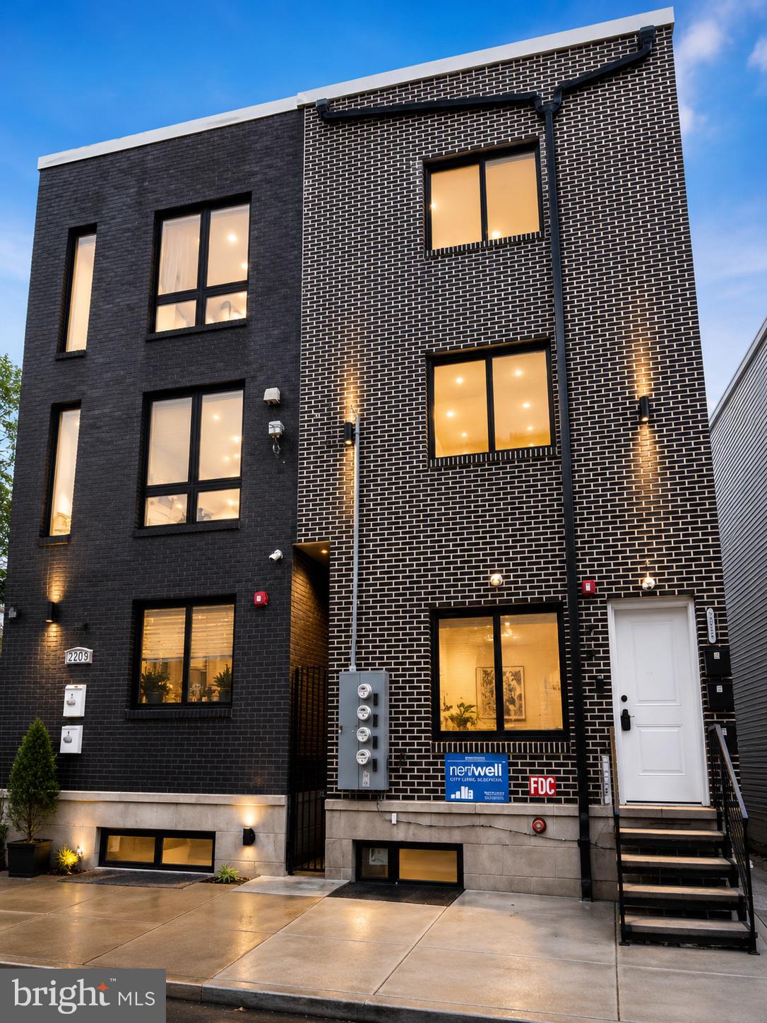 Exceptional turnkey investment opportunity featuring a fully leased new construction triplex generating $6,350 per month ($76,200 annually) and benefiting from a valuable 10-year tax abatement. This low-maintenance asset offers separate electric meters, modern construction, and strong in-place cash flow. The property consists of a 4-bedroom, 4-bath bi-level unit rented at $2,650/month, plus two 2-bedroom, 2-bath units rented at $1,800 and $1,900/month, with the top-floor unit featuring private roof deck access and skyline views. Each residence includes granite countertops, stainless steel appliances, luxury vinyl flooring, recessed lighting, central HVAC, in-unit laundry, and security system access. Strategically located just minutes from Temple University, Temple University Hospital, and within close proximity to Center City, Drexel University, the University of Pennsylvania, Jefferson Hospital, and other major medical and educational institutions, this fully occupied property is ideally positioned to attract a strong and consistent tenant base. With immediate income, minimal capital expenditure requirements, and strong long-term rental demand, this asset presents an outstanding opportunity for investors seeking stable cash flow and future appreciation in one of Philadelphia's fastest-growing neighborhoods.