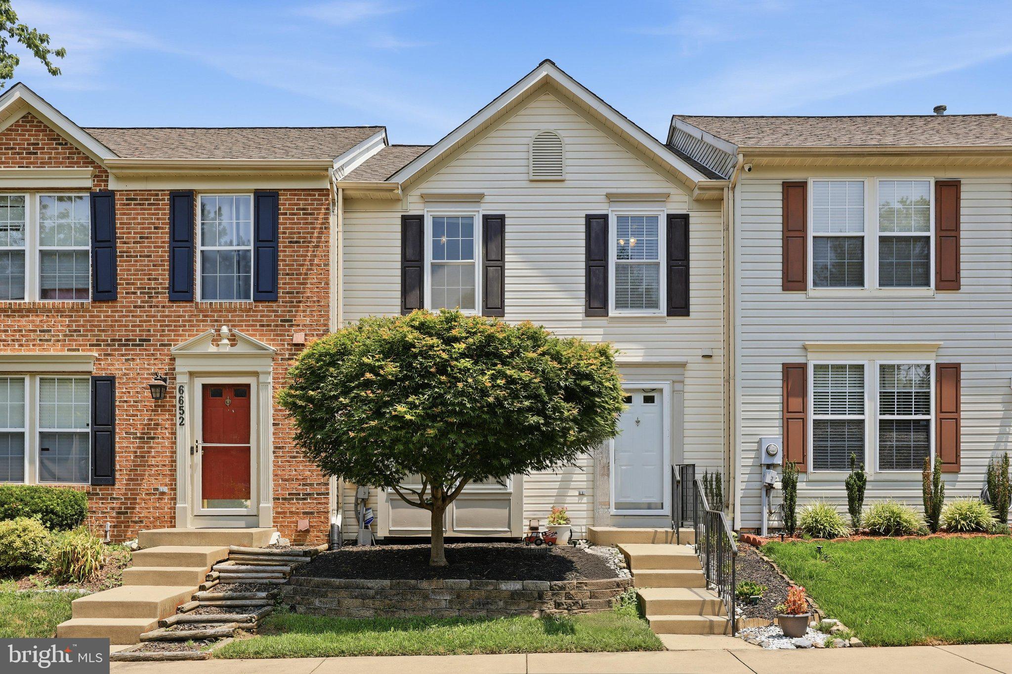 SELLER PREFERS LAWYERS SIGNATURE SETTLEMENTS
Nestled in the sought-after Ballenger Creek Crossing community, this immaculate 3-bedroom, 2 full and 2
half bath townhome has been meticulously maintained and thoughtfully updated throughout. Offering the
perfect combination of style, comfort, and function, this move-in-ready home is just minutes from
shopping, dining, commuter routes, dog parks, walking trails, and tot lots.
Step inside to an inviting open floor plan filled with natural light. The spacious living room has beautiful hardwood floors and features a bump out window. For convenience there is also a half bath and coat closet with shelves for storage.  
Multiple windows create an airy atmosphere in the large dining room. The large hutch is a perfect fit in the room and offers plenty of storage for dishes or whatever you desire to display.  Just off the dining room, the rear deck overlooks protected open space with scenic walking trails, creating a peaceful, private setting rarely found in townhome living.
The beautifully remodeled kitchen (2016) features updated cabinetry, countertops, and finishes, along with
a separate breakfast area perfect for casual dining. 
Upstairs, the expansive primary suite is a relaxing retreat featuring three large windows that fill the room
with natural light, an oversized walk-in closet, and a private en-suite bath. Two additional bedrooms and
another full bath complete the upper level.
The fully finished walk-out lower level offers exceptional additional living space, a convenient half bath, fireplace and direct access to the private, fenced backyard with a patio and oversized storage shed—ideal for
entertaining, relaxing, or extra storage. Like-new carpeting throughout the upper and lower levels reflects
the exceptional care this home has received.
Major updates provide lasting value and peace of mind, including a new roof (2018), Thompson Creek
replacement windows (2017), HVAC system (2016), a complete kitchen remodel (2016), and updates to all bathrooms.
Additional highlights include two assigned parking spaces conveniently located directly in front of the
home.
Pristine condition, quality updates, abundant natural light, generous and well thoughts out living space, and a private setting backing to open space make this an exceptional rare opportunity. Schedule your tour today.