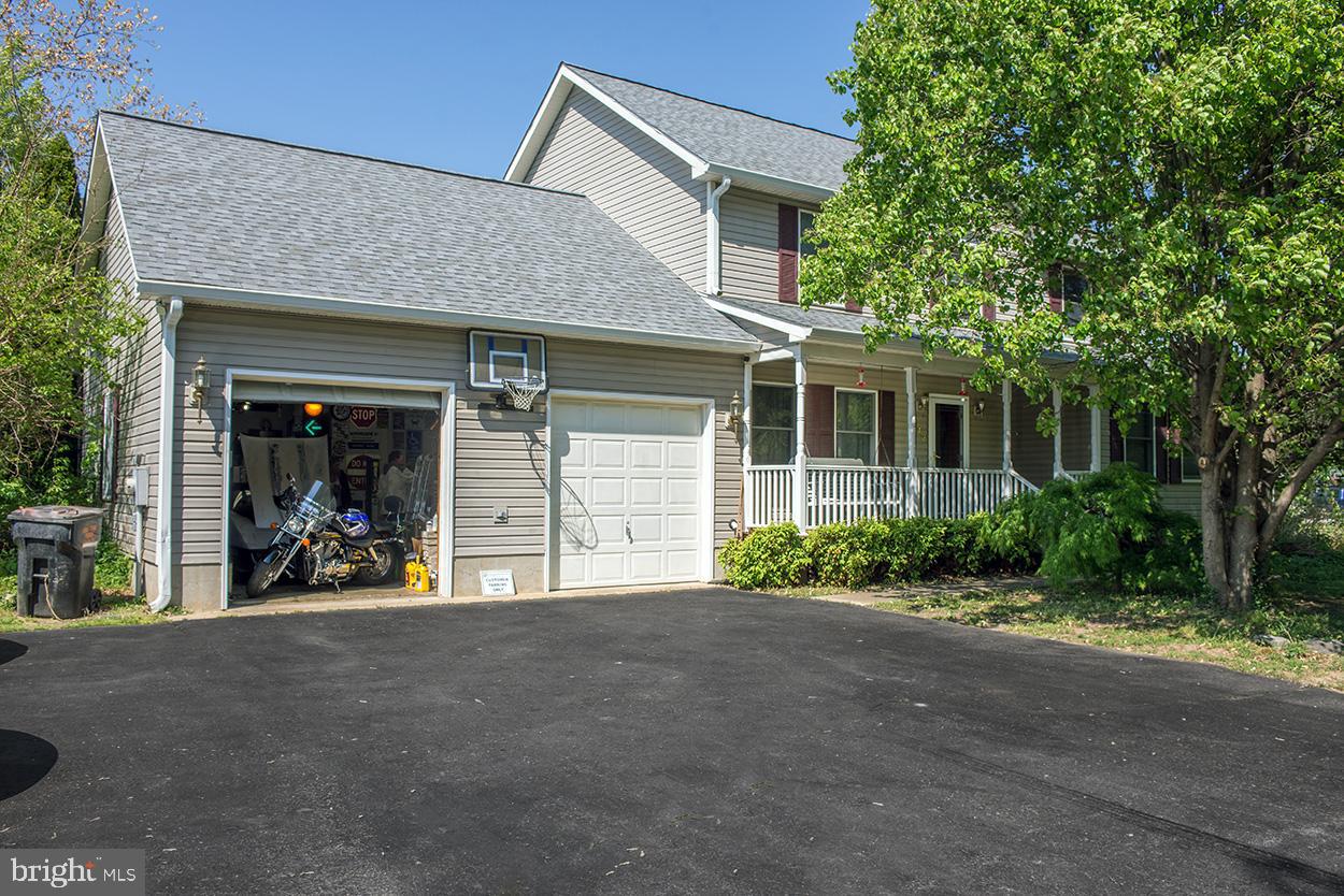 Dreaming of a peaceful, private rural retreat near the Chesapeake Bay. This beautifully maintained 4-bedroom, 2.5-bath Colonial offers the perfect blend of comfort, space, and outdoor living—all set on just over an acre of level, manicured land.

Enjoy your own private backyard oasis featuring a fully fenced 36' x 16' in-ground saltwater pool—perfect for relaxing or entertaining. The screened 3-season porch provides a tranquil space to unwind, while the cozy wood-burning fireplace and Bose surround sound system make the family room ideal for year-round enjoyment.

Inside, you'll find a traditional layout with a spacious family room, separate living room, and formal dining room. The kitchen is enhanced with a reverse osmosis water system and instant hot water for added convenience and everyday luxury. The primary bedroom includes charming under-the-eaves storage, offering both character and functionality.

Major updates provide peace of mind, including a new roof and gutters (2024), hot water heater (2023), and a 4-ton HVAC system (2021).

Complete with an exterior shed and plenty of open space, this property delivers the privacy of country living with convenient access to the Chesapeake Bay.