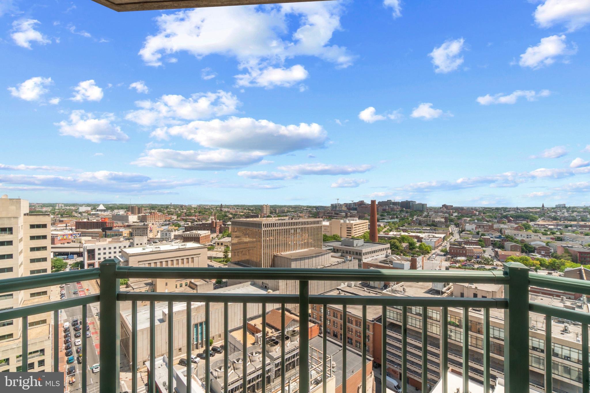 Outstanding, lightly used,  corner unit in 414 Water Street offering panoramic views east and across the harbor close to The John Hopkins Hospital and University of Maryland Medical Schools .

This unit boasts new hardwood floors and new stainless steel appliances (2021).  The kitchen in this corner unit with high breakfast bar for seating is set back and overlooking an expansive living room with your own gas fireplace which provides both comfort atmosphere in your new city home.

2 large bedrooms with 2 full bathrooms provide ample and private spaces to relax.  Finally, your private balcony has sweeping views overlooking Baltimore city and the Inner harbor.