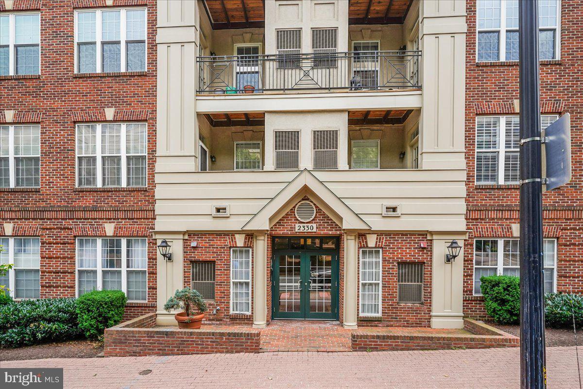 Rarely available!  Beautiful top floor, 2 level condo with 2 bedrooms, 2 baths! Over 1,300 sq feet! Hardwood floors throughout! Gourmet kitchen with pass thru to living room! Gas cooking! High cabinets!  Laundry is top of the line Profile All in One washer/ dryer for minimized space usage! Great space in living room! Special Murphy Bed space that has been converted to entertainment alcove with lights! Buyer can convert back if desired! Gas fireplace with heat unit and display alcove! Balcony for relaxation! New sliding glass door! Large, main level bedroom with new windows and shutters! Closet was designed and installed by Closet America to maximize capacity! Main level bathroom has updated tile and high capacity soaking tub! Upstairs is the large primary bedroom with ensuite, updated bathroom! Bedroom has lots of floor space and an overlook to living room which, when doors are open,  lets in light from outside and below! Bathroom has double sinks, large soaking tub and walk in shower! Closet designed and installed by Closet America! Warranties for closets, windows and sliding glass door convey! Elevator building! Secure garage parking  space conveys! Trash room is convenient to unit! Building amenities include clubhouse, pool, fitness center and more! Courthouse/Clarendon location! What could be better for convenient commuting and living! Close to so many restaurants, shops, grocery store, theaters and more! Metro an easy walk! Less than 1.5 miles from DC!