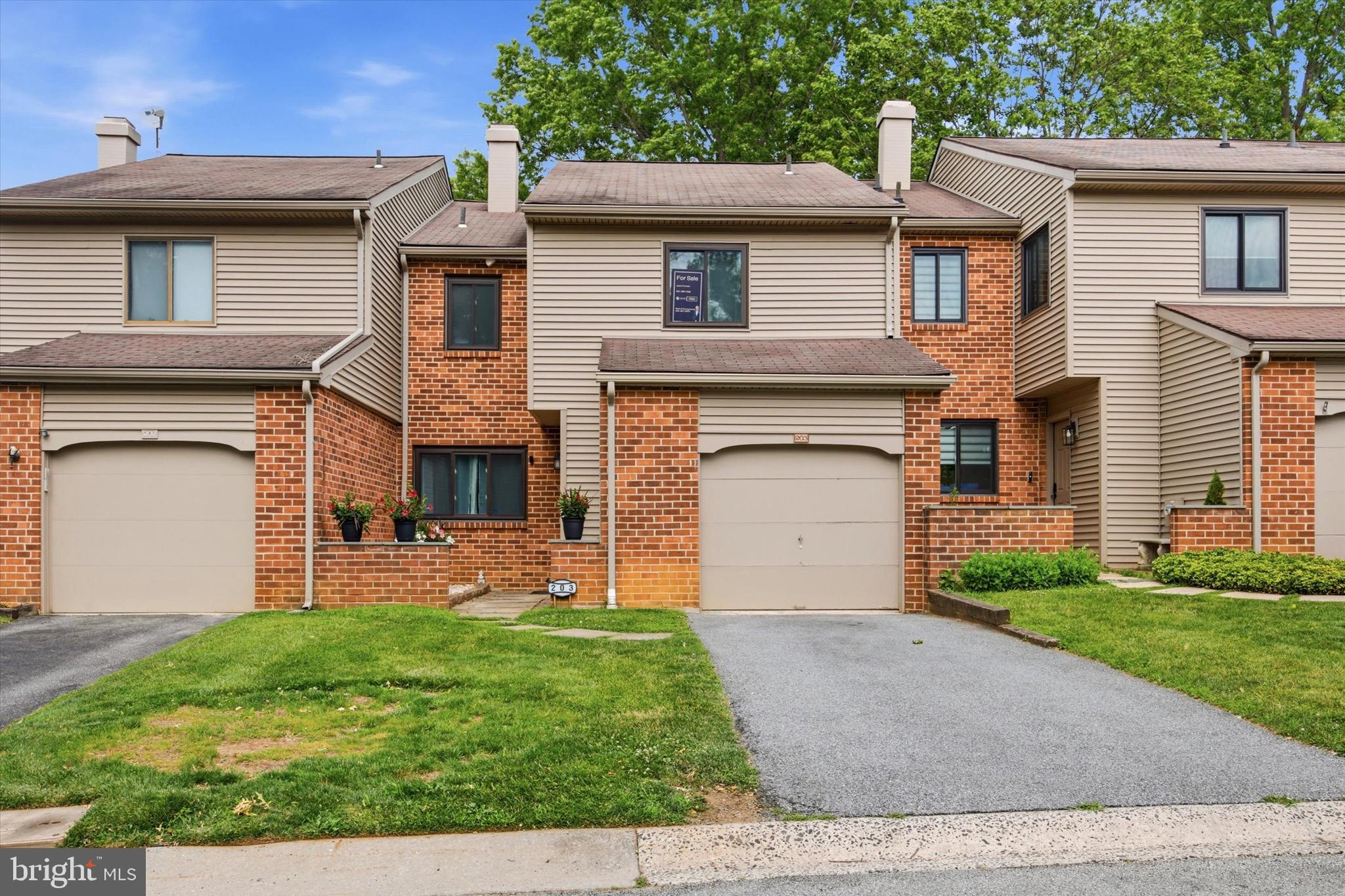 Welcome to 203 Camsten Court, a beautifully maintained 3-bedroom, 2.5-bath townhome nestled in the highly sought-after Chesterbrook community.

Step inside to a welcoming living room featuring a cozy wood-burning fireplace, creating the perfect space for relaxing or entertaining. To the right a short hallway provides access to the attached garage, a convenient coat closet, and a powder room. The kitchen offers stainless steel appliances, a double oven, ample cabinetry, and generous workspace for everyday living. Adjacent to the kitchen are the dining room and spacious family room, where sliding glass doors open to a private patio with views of Valley Forge Middle School and athletic field.

Upstairs, the primary suite features a walk-in closet, dedicated vanity area, an en-suite bath with a beautifully updated marble tile shower. The two additional bedrooms share an updated hall bath finished with marble subway tile. A second-floor laundry area with washer and dryer adds everyday convenience.

Additional highlights includes a whole-house water filtration system, and a garage which includes a dedicated Tesla charging station, offering added convenience for electric vehicle owners and those looking to embrace EV living. The unfinished lower level offers abundant storage and flexible space for a home gym, workshop, recreation area, or future finished living space.

Residents enjoy Chesterbrook’s extensive walking trails, open green spaces, and convenient access to Valley Forge National Historical Park, King of Prussia, major commuter routes, shopping, dining, and the award-winning Tredyffrin-Easttown School District.

Combining updated baths, generous living space, open rear views, and an exceptional location, 203 Camsten Court presents a wonderful opportunity to enjoy one of Chesterbrook’s most desirable communities.
