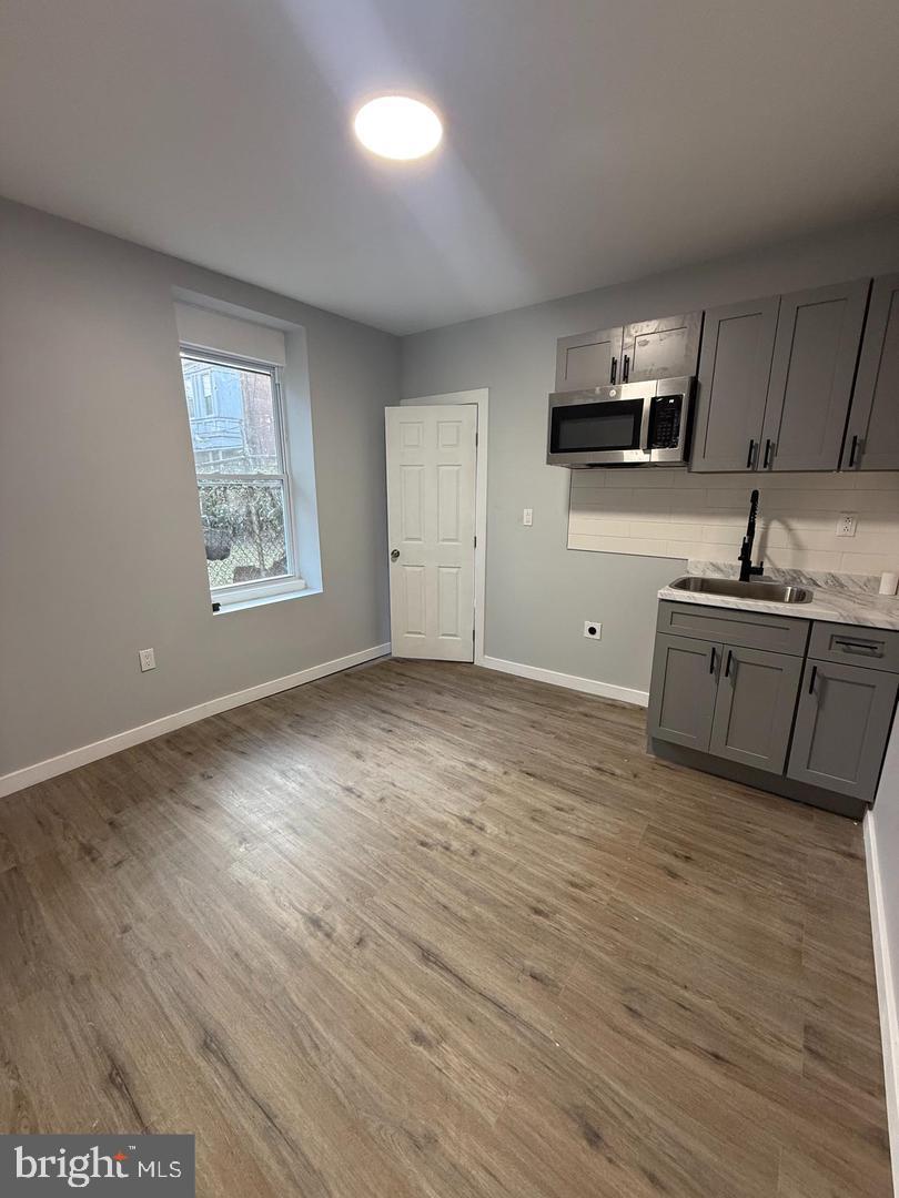 I’m proud to present this fully remodeled turnkey quadruplex. Boasting three floors and four apartments. This building is perfect for your next real estate investment. The building consist of three one bedroom apartments and one spacious two bedroom apartment. Building brings in a total of $4,700 in rent. Renovated top to bottom with new kitchens, bathrooms, electric, plumbing, water heaters and roof. This artistically designed building with modern finishes, light pine colored flooring, and crisp gray walls can be your next turnkey investment. Schedule your showing today!