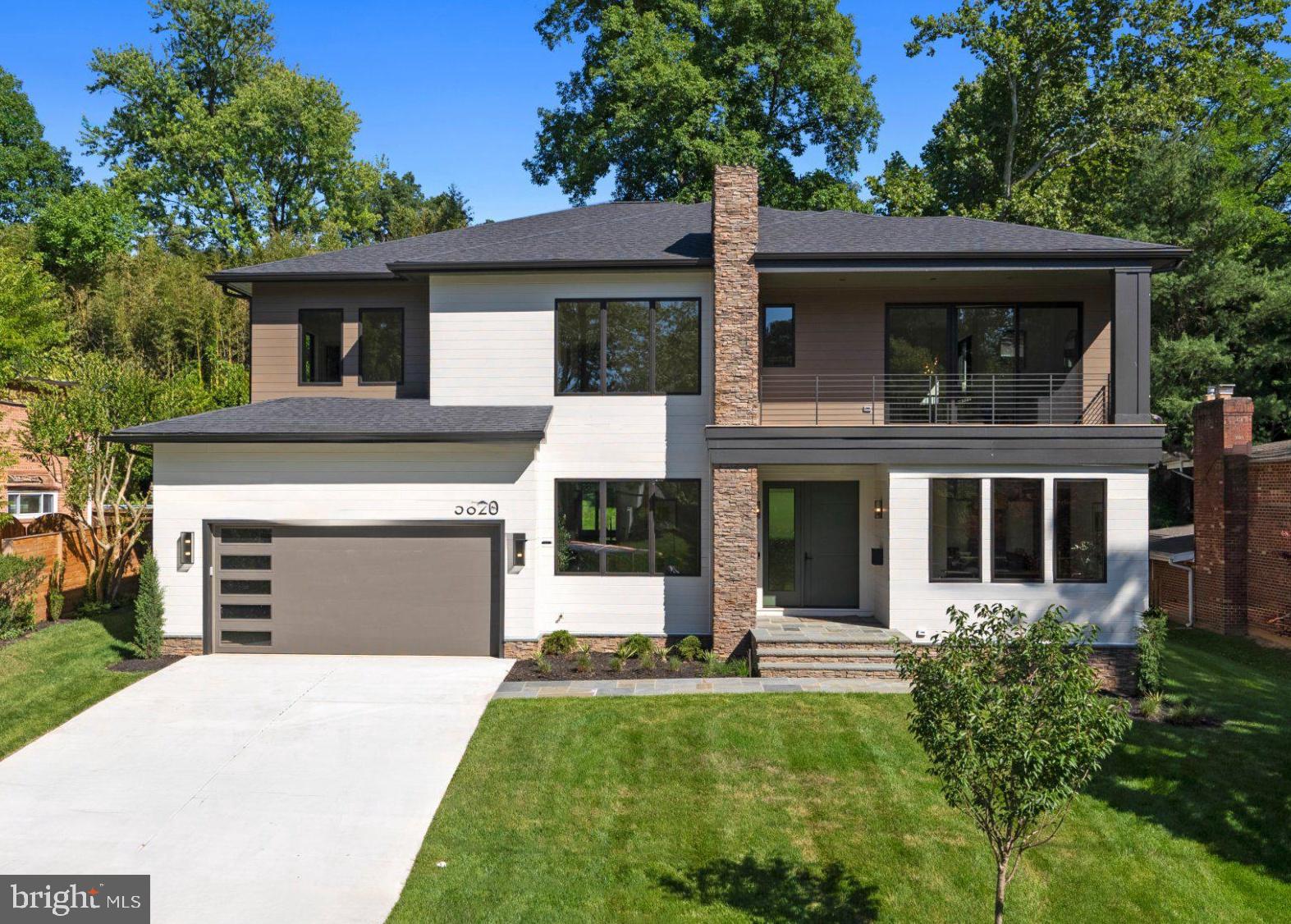 Enviable Kenwood Park location about a mile to Bethesda Row and Capital Crescent Trail, this newly constructed Mid-Century Modern masterpiece, built by Foxhall Homes and designed by Elie Ben Architecture, balances sophisticated design with livability, featuring a private Savaria Eclipse elevator and seamless indoor-outdoor living.
<br>
<br>
Expansive outdoor living spaces including covered porches, second floor balcony, and slate grilling patio define the home’s signature aesthetic. Wide-plank white oak floors, Visual Comfort lighting, solid-core doors with Emtek concealed fastener hardware, and illuminated tray ceilings throughout the main level reinforce an organic modernist feel. Architectural Digest named Visual Comfort as *one of the best sources for great lighting allowing optimal ambiance at any time of day.*   
<br>
<br>
The heart of the home is a chef’s kitchen anchored by an 8-foot Le Blanc Quartzite island surrounded by sleek European style cabinetry. The culinary engine is a JennAir 48” Noir professional range paired with paneled 48” Jenn-Air refrigerator. The fully equipped butler's pantry with integrated under shelf lighting, wine refrigerator and sink serves as a discreet service area for effortless hosting and organized storage.
<br>
<br>
Open living spaces are designed for presence and comfort. A sculptural ring chandelier with burnished brass and fluted glass shades floats above the gas fireplace.  The family room, with illuminated tray ceiling accents, features direct access to the full-width bluestone covered terrace overlooking the serene yard.
<br>
<br>
The primary suite is a sunlit sanctuary with expansive views from the triple casement bathroom windows and a quad-set in the bedroom.  The spa-inspired bath offers radiant-heated floors, curbless two-person shower with thermostatic controls, six-foot solid-surface tub with Kallista filler, and vanities illuminated by sconces from Visual Comfort.
<br>
<br>
The lower level impresses with nearly 9-foot ceilings, a full service bar, custom home gym, and premium finishes—ideal for media, entertaining, or overnight guests. 
<br>
<br>
Beyond stunning aesthetics, this home is engineered to last, exceeding building standards with superior materials: Huber ZIP System sheathing, Advantech subflooring, and Andersen 400 Series casement windows. The low-maintenance exterior combines Hardie Artisan and Boral composite siding with elegant cut stone accents from El Dorado—built to look flawless for decades.
<br>
<br>
Smart & Efficient Systems include:
<br>
<br>
-   5-zone in-ceiling speakers with Sonos and VSSL amplification and AirPlay <br>
-   Dual-system, Four zone Carrier high-efficiency HVAC with Ecobee thermostats <br>
-   Pre-wired for full security suite and a whole-home mesh network <br>
-   EV-ready garage with R-9 insulated high-lift door and epoxy painted floor <br>
-   85” TCL TV with Sonos surround sound and subwoofer in Recreation Room <br>
-   65” Samsung Frame TV in the Family Room <br>  
<br>
Timeless Mid-Century design meets uncompromising craftsmanship in an unbeatable private setting. Schedule your private tour and experience the distinct character firsthand.