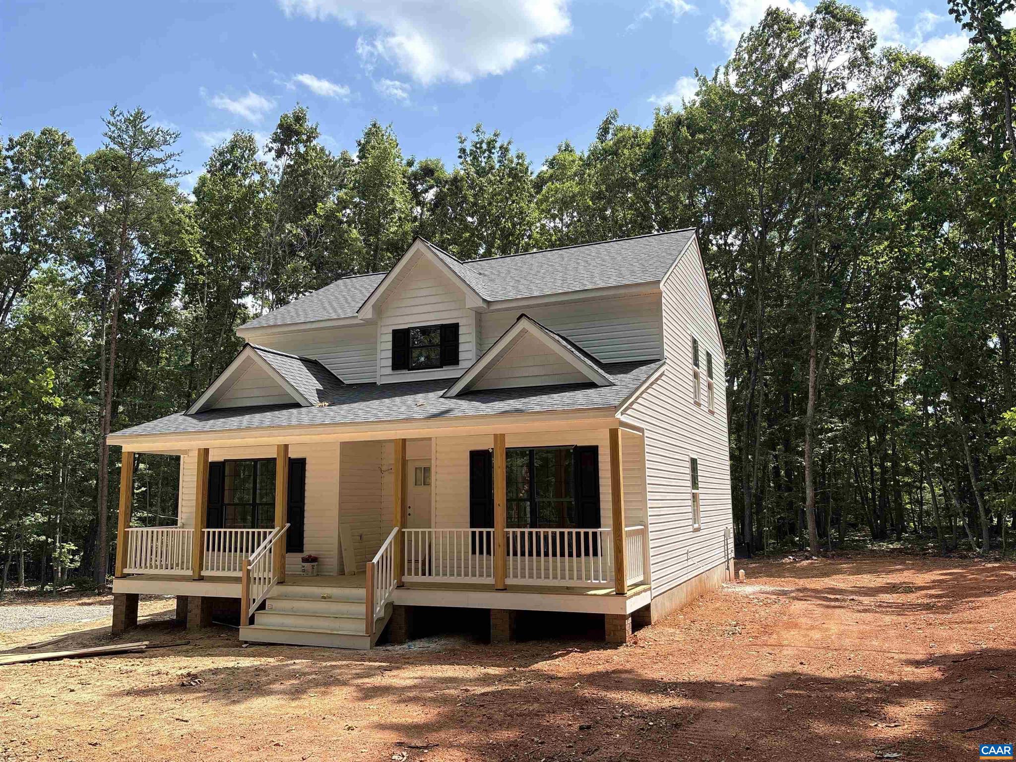MOVE IN BEFORE SCHOOL! THE NEW AVERY model is now under construction in Louisa! Still time to make selections! The Avery model with upgrades galore! The welcoming front porch boasts a craftsman style front door and shutters, wall lanterns and additional LED lights, black windows on the front of the house, white exterior siding with some shake in three sections and black gutters. The open concept floor plan with laminate flooring in the main levels, great room with ceiling fan, kitchen with 2x8 island, granite counter, stainless appliances, Tier 2 42" wall cabinets, french door leading to the 10x12 deck, mud room with trim package and half bath tucked away from the main living areas. The first floor master with ceiling fan lead to an ensuite bathroom with double bowl vanity, 5' shower, linen closet and walk in closet. The stairs are located off the kitchen to access the 3 bedrooms upstairs including the full bath, laundry room and pull down attic stairs. No HOA or WATER or SEWER Bills. Ask about saving $7,500 in Seller Paid Closing Costs.,Granite Counter,Wood Cabinets