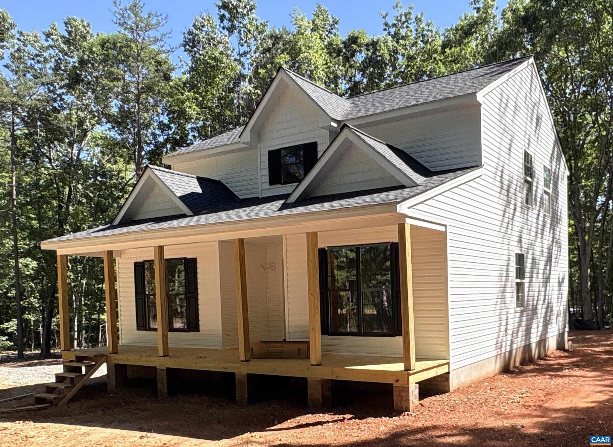 READY FOR PAINT AND CABINETS! (6/2) THE NEW AVERY model is now under construction in Louisa! Still time to make selections! The Avery model with upgrades galore! The welcoming front porch boasts a craftsman style front door and shutters, wall lanterns and additional LED lights, black windows on the front of the house, white exterior siding with some shake in three sections and black gutters. The open concept floor plan with laminate flooring in the main levels, great room with ceiling fan, kitchen with 2x8 island, granite counter, stainless appliances, Tier 2 42" wall cabinets, french door leading to the 10x12 deck, mud room with trim package and half bath tucked away from the main living areas. The first floor master with ceiling fan lead to an ensuite bathroom with double bowl vanity, 5' shower, linen closet and walk in closet. The stairs are located off the kitchen to access the 3 bedrooms upstairs including the full bath, laundry room and pull down attic stairs. No HOA or WATER or SEWER Bills. Ask about saving $7,500 in Seller Paid Closing Costs.,Granite Counter,Wood Cabinets