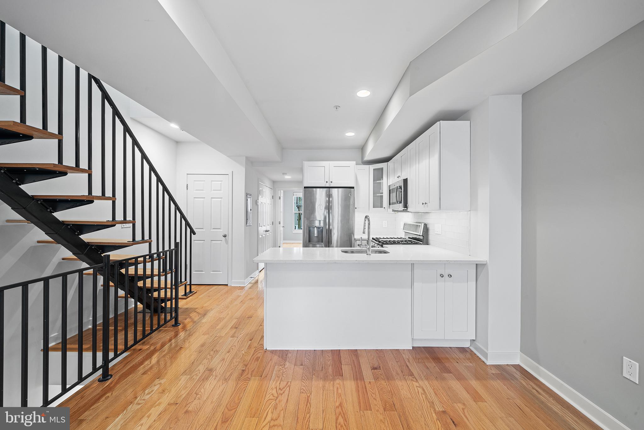 This extraordinary bi-level penthouse is a true gem, featuring a vast, private roof deck that offers some of the most jaw-dropping views of Center City Philadelphia. Whether you're relaxing with a morning coffee or hosting an evening soiree, the views from this space are truly unparalleled.

The main floor welcomes you with a spacious, open-concept living area, once split between a living room and third bedroom, now seamlessly transformed into an expansive common space. A smaller private balcony offers a peaceful outdoor retreat. The sleek kitchen is outfitted with high-end GE appliances, elegant five-piece shaker cabinetry, and a stylish three-seat peninsula breakfast bar. Just off the kitchen, you’ll find a convenient closet with washer and dryer, as well as a second Jack and Jill full bathroom. The second bedroom is bathed in natural light and boasts exceptional views of Center City, complemented by a custom closet with built-in drawers and ample hanging space.

Ascend to the upper level, where you’ll find the perfect connection to the roof deck, a true highlight of this property. A beautifully designed Jack and Jill bathroom connects to a spacious bedroom, offering stunning views of the city skyline. The walk-in shower, complete with a striking river-rock wall, ensures you can enjoy those views while you unwind. The bedroom, with custom built-in storage and extra hanging space, completes this luxurious private retreat.

Located just one block from the Fairmount station on the Broad Street Line, this penthouse offers convenient access to Center City, Temple University, and the Stadium Complex. With a Walk Score of 91, this area is a true "Walker's Paradise," placing you steps away from The Met, charming coffee shops, and some of Philadelphia’s best restaurants. Shopping is a breeze with Ridge Ave. and Fairmount Ave. just around the corner, and iconic landmarks such as the Eastern State Penitentiary, the Art Museum, and Boat House Row are all within walking distance.

This is more than just a place to live—it's a lifestyle.

Utilities and Parking:

Landlord covers water, gas, and electric utilities.
Tenant responsible for renter's insurance and cable/internet.
Condo association maintains the entrance hallway and sidewalk area.
Parking permits for Zone 17 can be obtained through the Philadelphia Parking Authority, though no permit is required for parking on Brown Street.