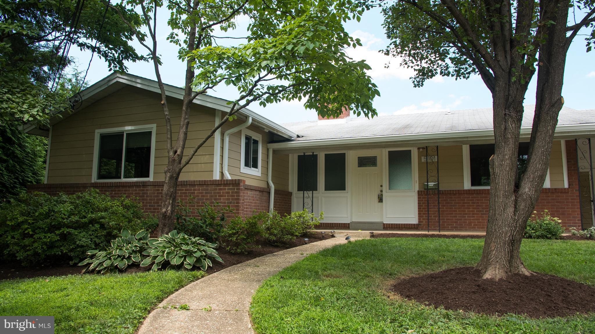 Beautiful home featuring 4 bedrooms,  3.5 baths. Gleaming hardwood floors. Updated  eat-in kitchen with granite countertops and stainless steel appliances. Spacious living and dining room area. Lower level family room with in-law/au-pair suite, wet bar and full bath. Private backyard with patio surrounded by mature trees. Perfect location close to Metro and shopping.  A MUST SEE!