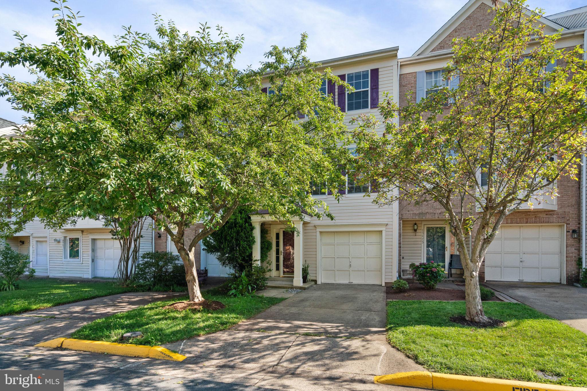 Welcome home to this charming 3-bedroom, 2-bath townhome, ready for your personal touches to make it truly your own. Freshly refinished hardwood floors and brand-new carpeting create a warm and inviting atmosphere throughout.

The spacious kitchen features stainless steel appliances, ample cabinetry, and a separate eat-in breakfast area—perfect for casual dining. Enjoy outdoor living on both the upper and lower decks overlooking the fully fenced backyard, ideal for entertaining, relaxing, or pets.

Upstairs, the primary suite offers a peaceful retreat with a beautifully renovated en-suite bath complete with a luxurious soaking tub. The finished lower level provides additional living space with a cozy family room or den featuring new carpet, a gas fireplace, and convenient laundry access. Step outside through the walkout to the lower deck and private, fully fenced rear yard.

Convenient to Routes 28, 7, Dulles Airport, and most importantly, Wegmans!
Conveniently located and full of potential, this home offers comfort, functionality, and the opportunity to add your own style. Don't miss your chance to make this wonderful property your next home!

Professional photos coming soon