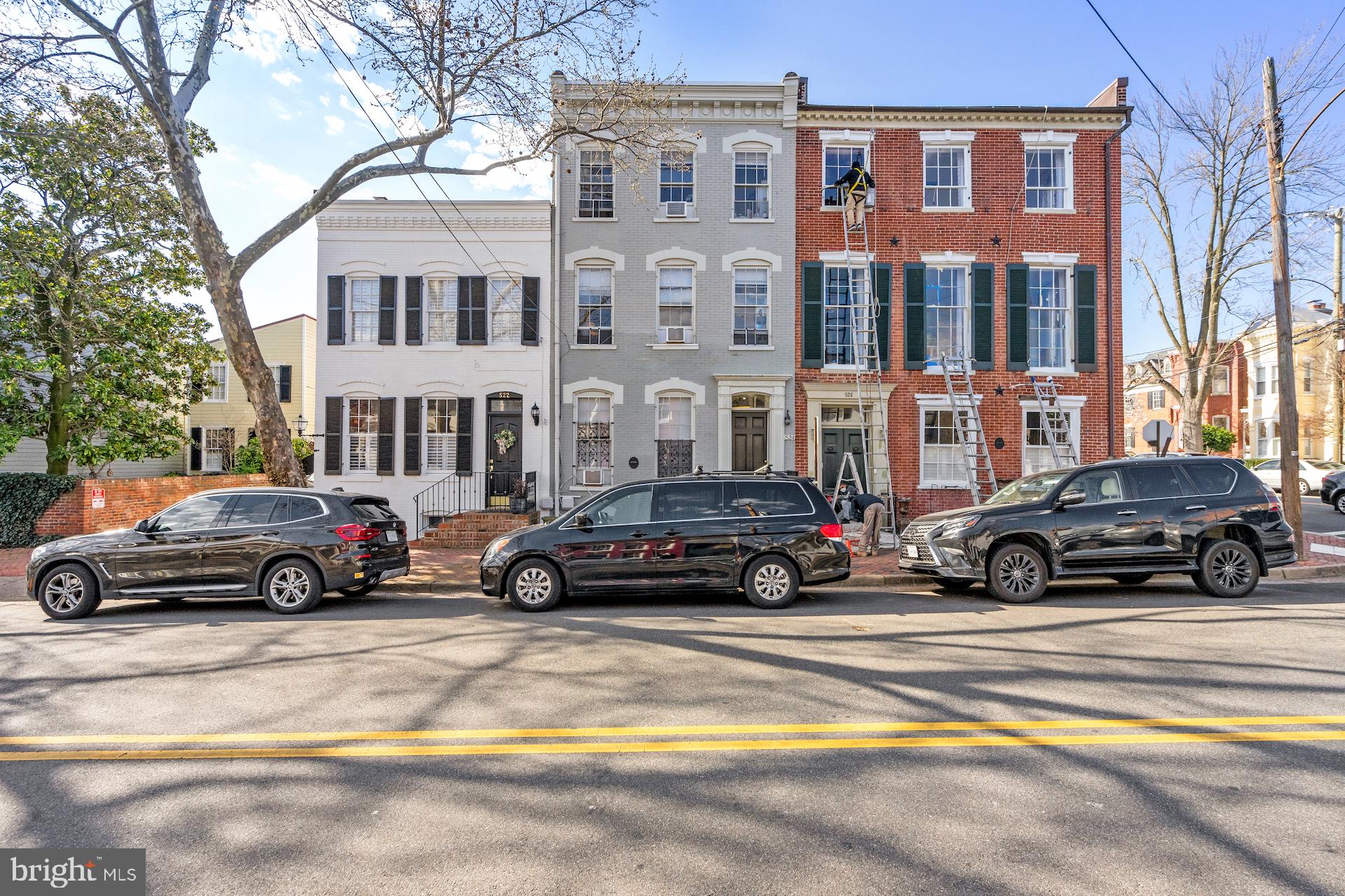 Rarely available 4 unit multi-family historic townhouse in the heart of Old Town only blocks from King St. This amazing investment opportunity features one efficiency unit, two light filled 1br units & a lovely 2br plus den, two level unit with wood burning fire place & patio access. Other features included original wide plank wood flooring & high ceilings.  All utilities are included in the rents. Units 1, 2, & 3 are serviced by window A/C units & radiators. Unit 4 is serviced by a separate heat pump distribution system for heating & cooling. There are two water heaters (replaced in 2021 & 2023) that service the building. Metal roofing was recently serviced & sealed by Springfield Roofing. Shared laundry and storage in the more than spacious basement. All units are currently rented. Contact listing agent with questions.