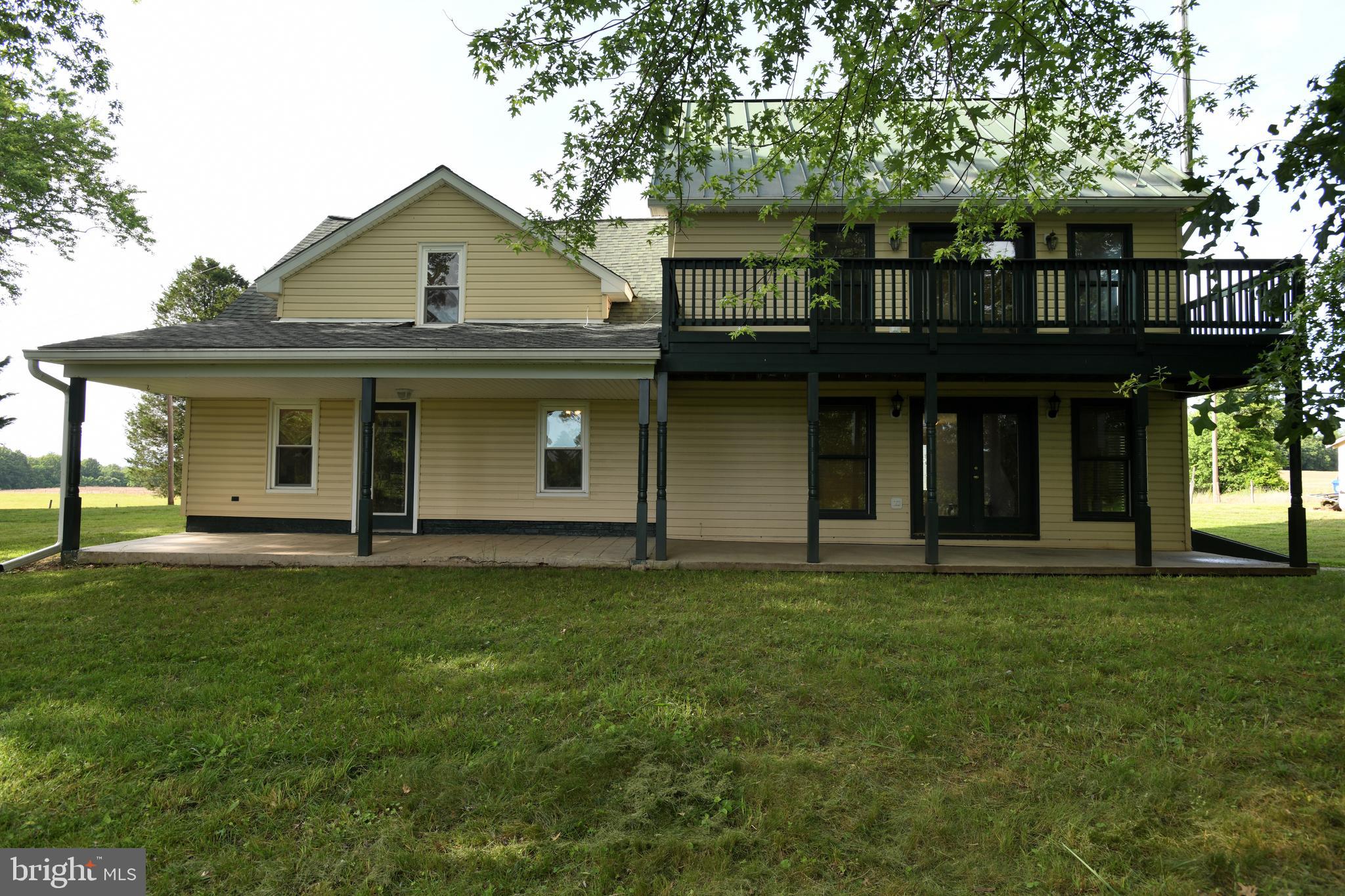Secluded estate on nearly 20 acres in Montgomery County's Agricultural Reserve. This 3-bedroom, 2.5-bath, 2,829 sq ft home was extensively remodeled in 2005 with a three-level addition, Pella windows, and metal roof. Property features include 15.93 acres plus 3.56-acre agricultural easement, ideal for horses and livestock, and historic ties to George Washington's Woodstock Estate. Interior highlights include a large kitchen with maple cabinets and granite counters, living room with wood stove, library with fireplace, and primary suite with French doors to upper deck. Original 1940s heart-pine and white-oak flooring on upper level. Located 1 mile from Woodstock Equestrian Park and trails, with easy MARC rail access to DC via Dickerson (2.3 mi) or Barnesville (4.7 mi) stations. Poolesville School District. Well and septic approved for 4 bedrooms.