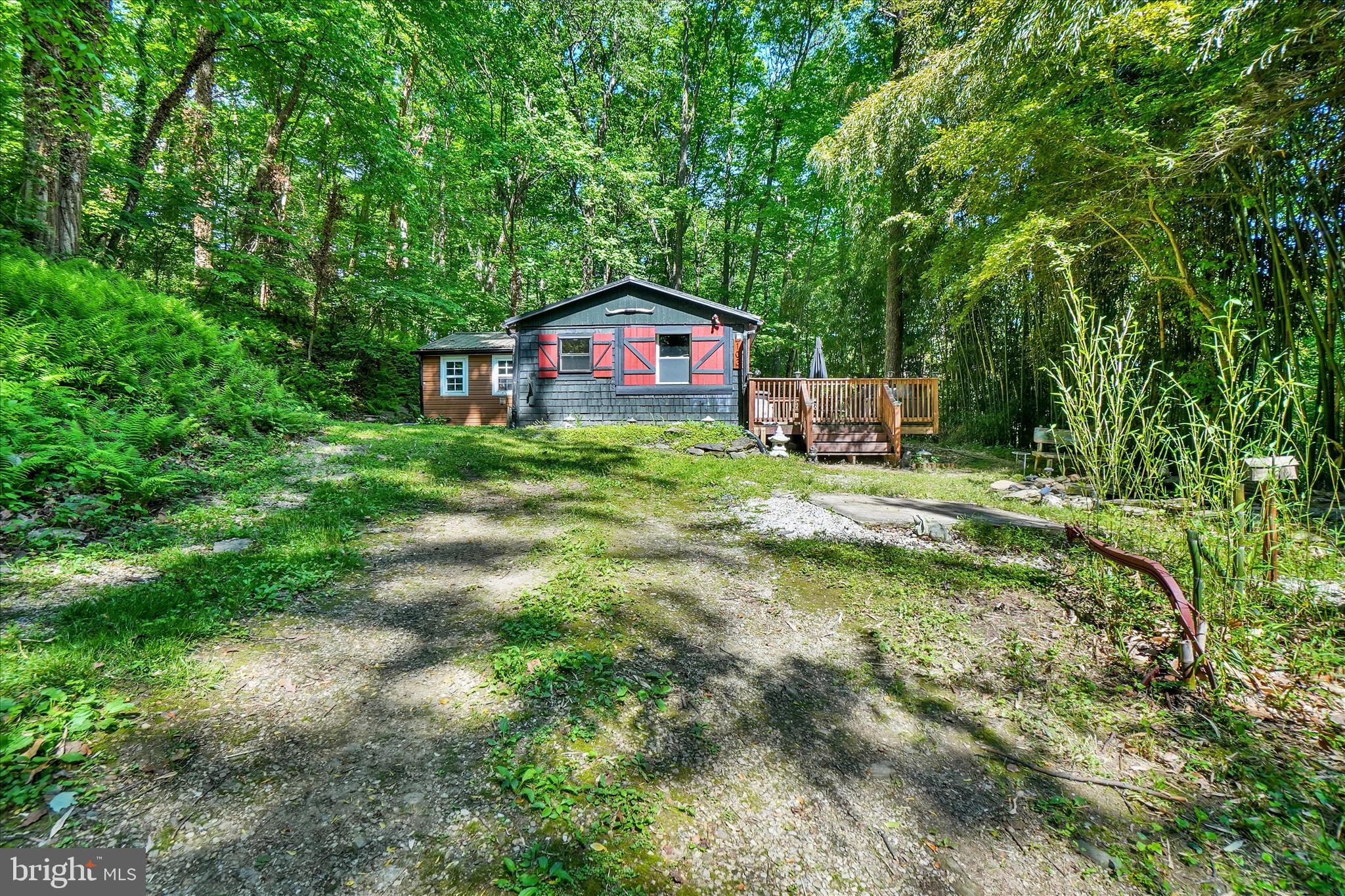 Secluded property on almost 1 acre near STOCKED  GRADE A FISHING stream  Muddy Creek. Come check out this beautifully restored 2-bedroom, 1-bath home tucked away in a peaceful setting. From the moment you pull up the driveway, you’ll be captivated by the charm and character this unique property has to offer.

The exterior features eye-catching cedar shake siding, a goldfish pond, two fire pit areas, and an oversized front porch that’s perfect for BBQs, entertaining friends, or simply relaxing outdoors.
Step inside to a welcoming kitchen featuring a deep farmhouse sink, and a countertop dining area with seating for two at the window overlooking the cozy living room. The living room offers vaulted ceilings and a wood-burning stove, creating the perfect space to relax and unwind year-round.
The light and airy primary bedroom features sliding glass doors leading to a private second porch area, providing a peaceful retreat to enjoy your morning coffee or evening sunsets.
Recent updates include electric, an updated bathroom, updated plumbing in the kitchen and bath, a metal roof that is only a few years old, and the addition of a generator for added peace of mind.
This home is truly an entertainer’s dream, offering the perfect setting to gather around the fire under the stars during warmer months or cozy up inside during the winter  and watch your favorite movies, seller uses T-mobile WIFI  let your worries melt away.
Home comes fully furnished. Township allows Air BNBs or use this for your full-time residency. Schedule your private showing today!