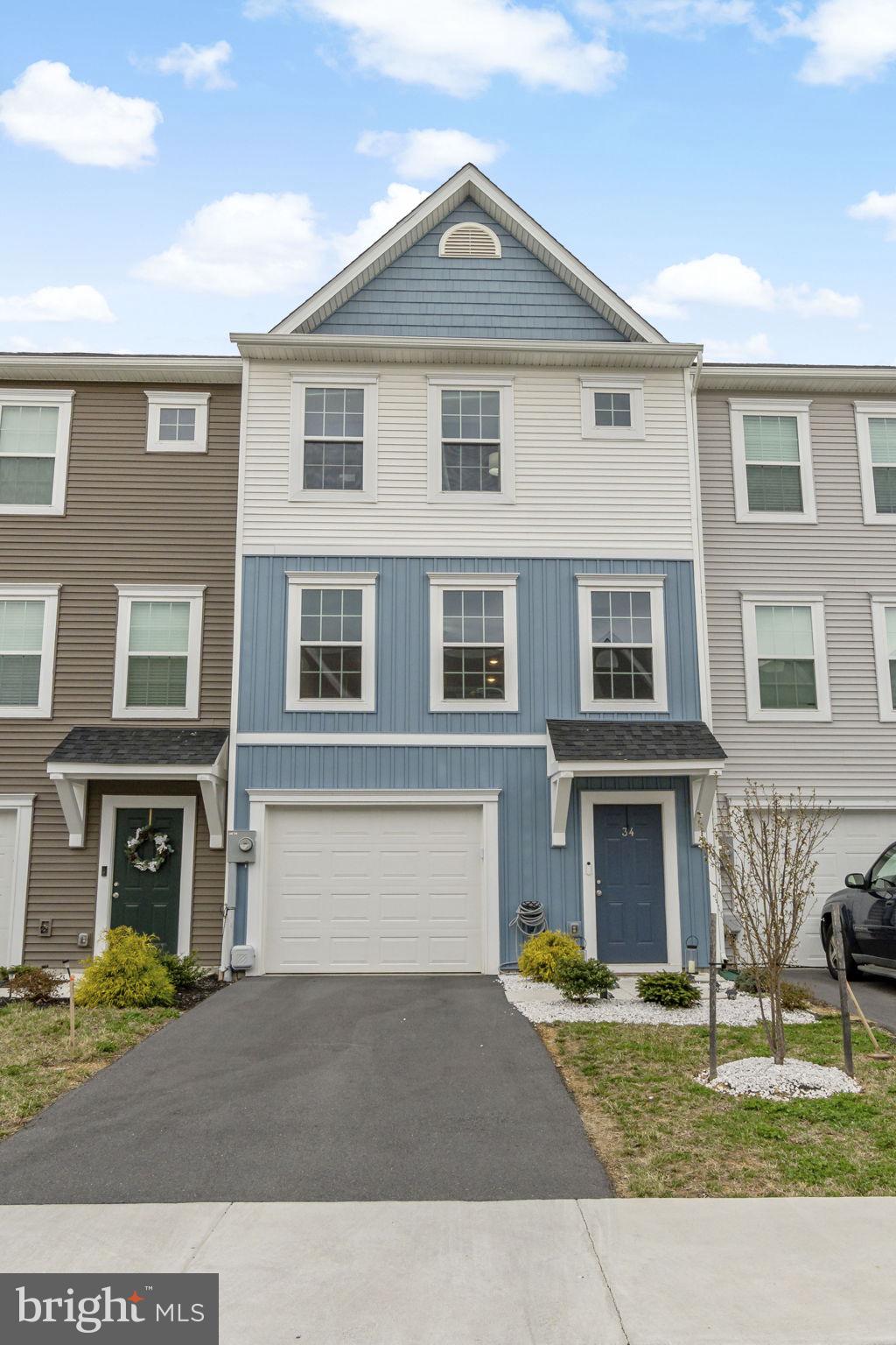 34 Starting Gate Place offers a move-in ready lifestyle in the well-established Bridle Creek community of Martinsburg. This townhome combines comfort, functionality, and location—making it an easy choice for buyers looking for both space and convenience.

Inside, you'll find low-maintenance vinyl flooring throughout the main living areas and kitchen, making cleanup a breeze and giving the home a modern, durable touch. On the first level, there’s a flex room that’s perfect for a home office, workout space, playroom, or even a potential fourth bedroom. Step out from the main level to a private deck—ideal for grilling or enjoying the outdoors in your own space.

Commuters will love the proximity to I-81, WV-9, and US-11, making travel to Hagerstown, Winchester, Charles Town, and the D.C. metro area quick and accessible. The MARC train station is just a short drive away for those who prefer to ride into the city.

With ample storage in the garage and unfinished basement, a smart thermostat, and a location close to shopping, schools, and restaurants, this home is built for modern living. Close, unpack, and start your next chapter here.