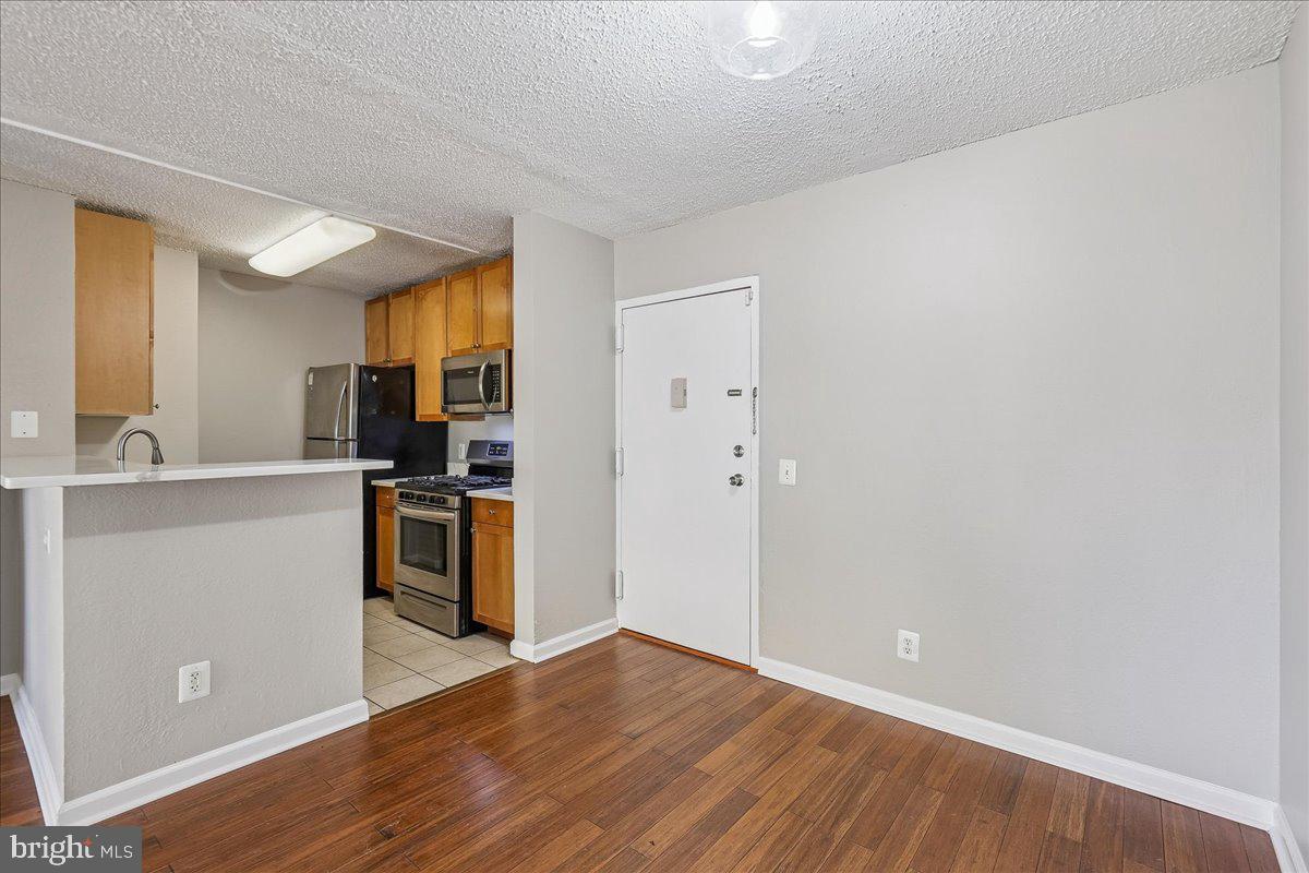 New Price!! Move-in ready 2-bedroom, 2 bath condo where ALL utilities and amenities are included in the condo fee. Enjoy the added convenience of shuttle service to the Van Dorn Metro station (less than 1.5 miles away). The condo fee delivers exceptional value, covering not just utilities but an impressive lineup of amenities: a main-level laundromat and Amazon Hub, dog park, outdoor pool, fitness center, clubhouse, playgrounds, and beautifully maintained picnic and grilling areas. Everything you need is right at your fingertips.

Inside, you will find 2-bedroom layout, with each bedroom featuring its own private bathroom and mini-fridge. The home also includes a shared washer/dryer combo, an open-concept living space, and a private balcony for relaxing. Located in the sought-after Twenty-One community within West End Condominium, this stylish mid-rise unit boasts fresh paint, laminate flooring, stainless-steel kitchen appliances, and granite countertops.

Perfectly positioned for convenience, this community sits directly across from Van Dorn Plaza, offering a vibrant mix of restaurants, grocery stores, and even an animal hospital. Easy access to the Metro, as well as major highways (I-395 and I-495), and less than 10 miles from DCA Airport.