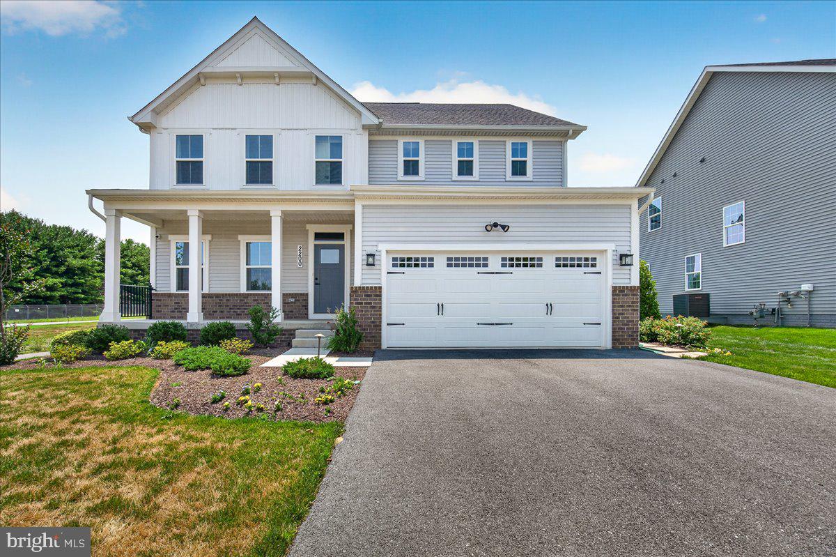 Nestled in the prestigious Sycamore Ridge community, this exquisite Georgian-style residence, completed in 2025, offers a harmonious blend of luxury and comfort. Spanning an impressive 3,720 square feet, this detached home is designed for those who appreciate high-end living and modern conveniences. Step inside to discover a thoughtfully crafted interior that exudes elegance. The open floor plan seamlessly connects the living, dining, and kitchen areas, creating an inviting space perfect for both entertaining and everyday living. Crown moldings and recessed lighting enhance the ambiance, while the cozy fireplace with glass doors and a marble mantel serves as a stunning focal point in the living area. The gourmet kitchen is a chef's dream, featuring upgraded countertops, a spacious island, and top-of-the-line stainless steel appliances, including a double oven and ENERGY STAR-rated refrigerator. The butler's pantry adds an extra touch of sophistication, making hosting gatherings a breeze. Enjoy casual meals in the breakfast area or at the kitchen table space, all while overlooking the beautifully landscaped rear yard. This home boasts four generously sized bedrooms, including a luxurious primary suite complete with a walk-in closet and a spa-like primary bath and another main level bedroom and full bath. Each bathroom is designed with modern fixtures and finishes, ensuring comfort and style for all. The exterior of the property is equally impressive, situated on a premium corner lot with lush landscaping and scenic views of the garden, pond, and surrounding vistas. Enjoy outdoor living on the expansive deck or porch, perfect for morning coffee or evening relaxation. The property is equipped with underground lawn sprinklers and flood lights, enhancing both beauty and security. Additional features include a full, partially finished basement, an attached two-car garage with electric vehicle charging capabilities, and energy-efficient windows that provide both comfort and savings. The home is also equipped with a high-efficiency tankless water heater and a humidifier, ensuring a comfortable living environment year-round. Located in a vibrant community with easy access to amenities. Experience the exclusive lifestyle that this remarkable property offers, where luxury meets comfort in every detail.