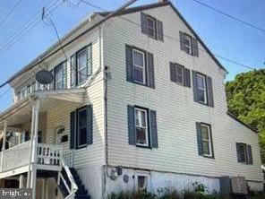 Welcome to 22 S Church Street!  This charming 3 bedroom 1.5 bath corner residential property offers a unique opportunity to embrace a lifestyle filled with warmth and connection.   The entrance features a private front porch to relax and enjoy a morning cup of coffee.  Enter into this renovated home to discover a cozy nook and living area. The beautiful updated kitchen allows you to exit into a patio area with a generous size private fenced in yard.   Two bedrooms and a beautiful full bath are on the second floor and the third floor features the third bedroom.  A full unfinished basement provides ample storage space for all  your needs.  This is a wonderful neighborhood known for its friendly atmosphere, where neighbors become friends and community events bring everyone together. Enjoy the convenience of nearby parks, perfect for leisurely strolls or weekend picnics, and top-rated Spring-Ford Area schools that foster a nurturing environment for learning. Local shops and cafes are just a short distance away, providing a delightful mix of convenience and charm. Public services are readily accessible, ensuring a seamless living experience.   Perfect for first time home buyers or investment opportunity!