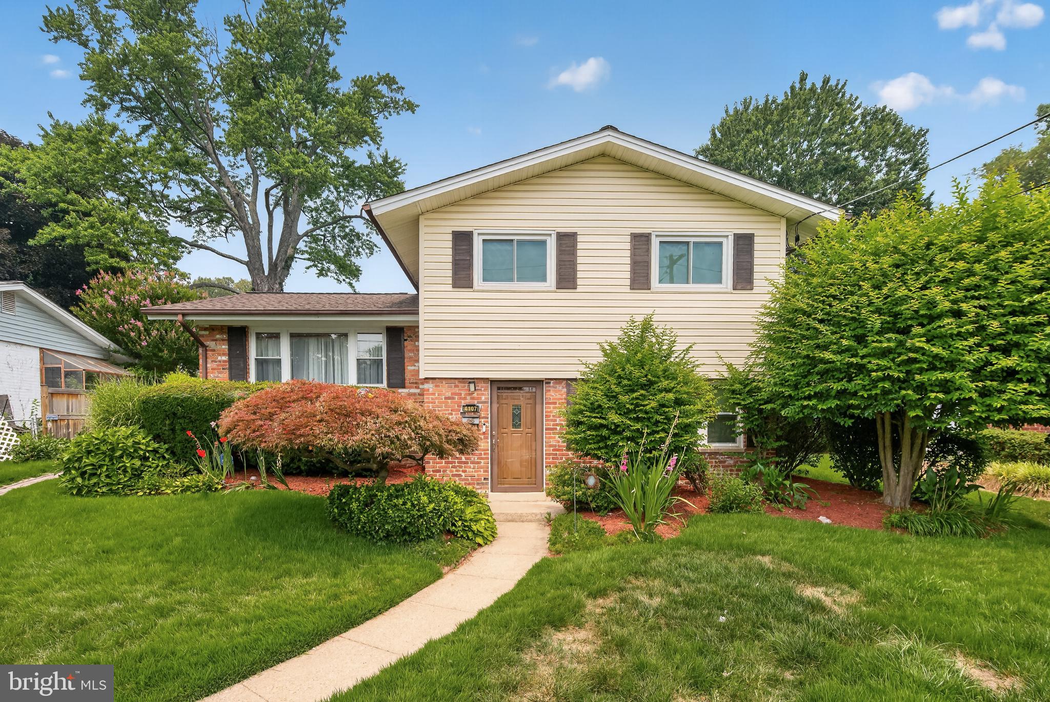 A truly hidden gem.  Expanded 4-level split with two additions.  Two-story addition adds expanded primary bedroom with private full bath and large walk-in closet.  lower level of addition adds 4th bedroom with private full bath, and separate entrance.  Second addition adds sun room or breakfast room off of kitchen.  Lots of finished square footage.  Very quiet street.  Newer roof and a/c.  Beautiful landscaping.  Private driveway.
