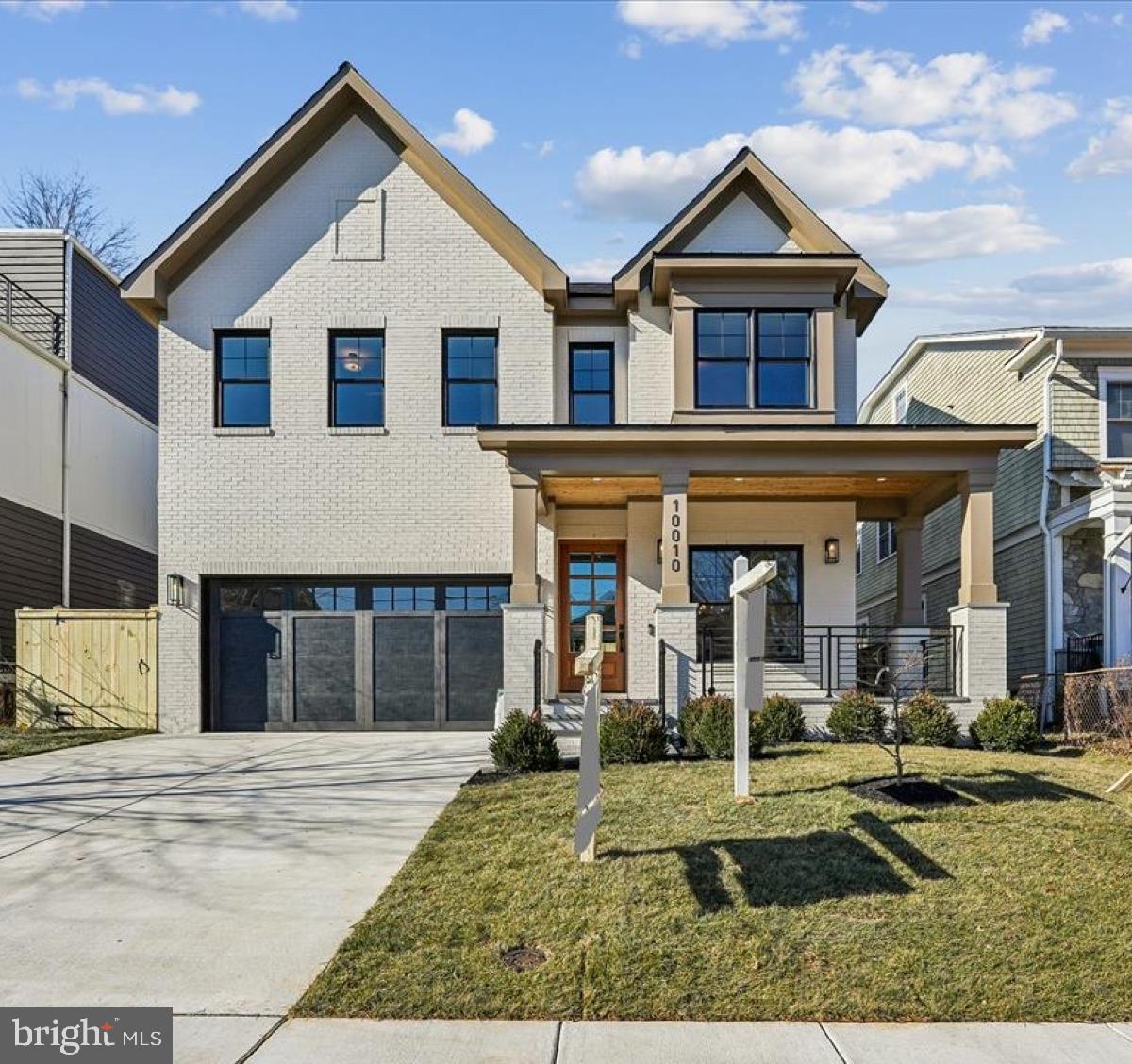 Welcome to 10010 Edward Avenue, built by esteemed builder, ERB Properties! This extraordinary home offers an amazing open floor plan with 4 finished levels, 6 bedrooms, 5.5 bathrooms and over 4,800 square feet of living space! Featuring beautiful craftsmanship and finishes, abundant recessed lighting and wide plank hardwood floors, it is ready for you to move right in! The main level includes a living room, formal dining room, gourmet chef’s kitchen with high end appliances, soft close cabinets & drawers, quartz countertops, an island, a breakfast area and a pantry. The main level also features a light and bright family room with a gas fireplace, a large mudroom with cubbies and a bench, a powder room and a covered porch. The spectacular upper level boasts a primary suite with two walk-in closets and a luxurious spa bathroom with a separate oversized frameless glass enclosed shower, a soaking tub and two sinks. Also on the upper level are 3 additional bedrooms, 2 additional full bathrooms and a laundry room with a washer and dryer. The lovely second upper level features a light and bright family/homework-study area, a bedroom and a full bathroom. On the inviting lower level you will find a recreation room with a wet bar and beverage refrigerator, a 6th bedroom, a 5th full bathroom, an exercise room with a rubber mat and mirror, additional storage and a separate walk up side entrance. Located in the sought after North Bethesda Grove subdivision, this home is part of the Walter Johnson High School cluster.
