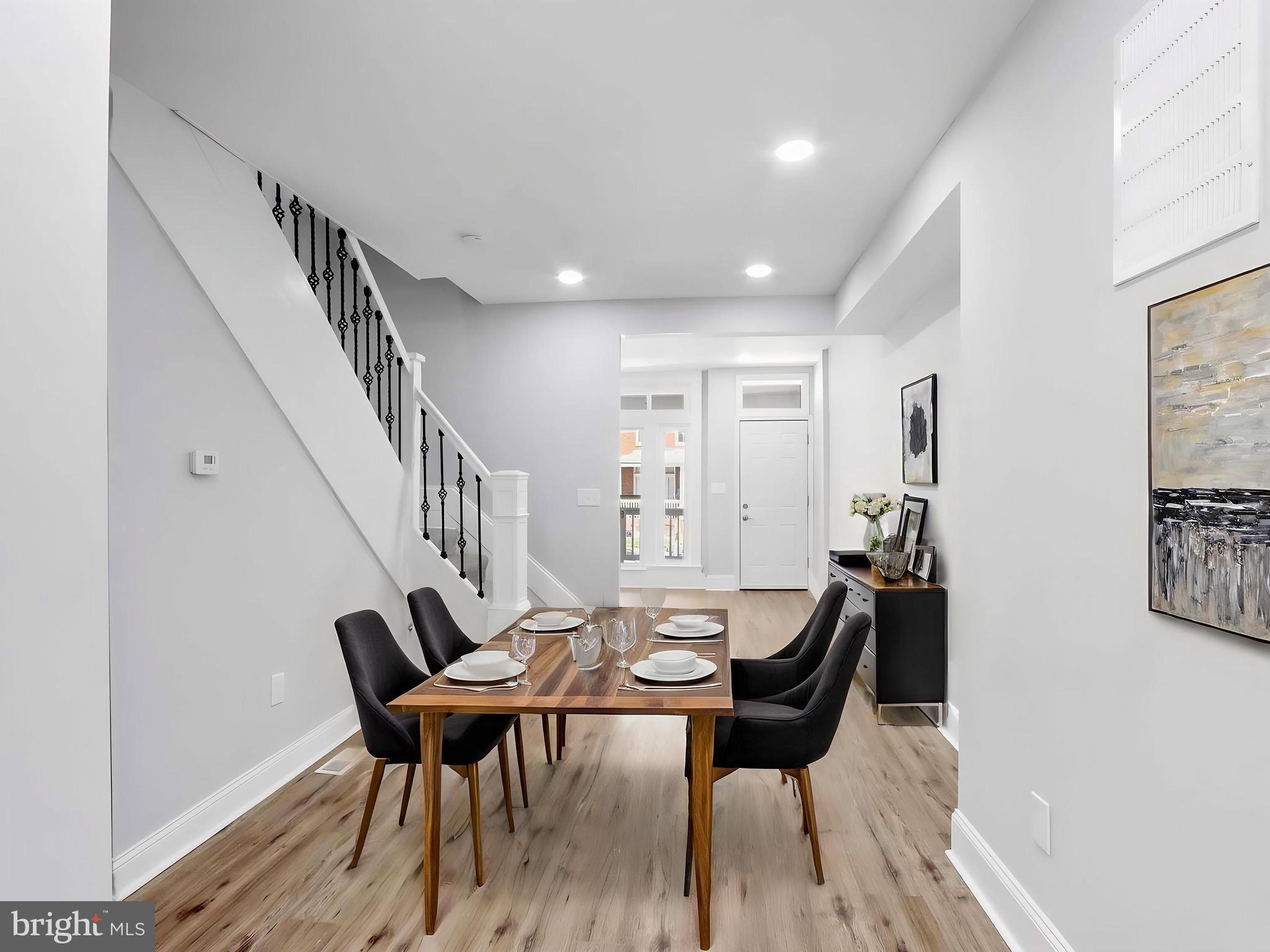 Experience comfort, character, and opportunity at 819 Belgian Ave—where affordability meets lifestyle in Baltimore’s vibrant 21218 community. Perfect place to call home why rent when you can buy, this move-in ready home blends thoughtful updates with timeless charm. Enjoy the neighborhood vibe, quick access to Johns Hopkins University, and easy commutes downtown or to I-83. With the right mix of upgrades, convenience, and value, this home is more than a property—it’s a smart investment in your future. Newly renovated home, where modern elegance meets timeless charm! A rare gem!This LARGE 3-level home has 5 freshly painted bedrooms plus 2 full bathroom  has been thoughtfully updated with newly renovated kitchen, bathrooms, flooring, heating system (2024), enjoy new finishes like quartz countertops, energy efficient stainless-steel appliances, designer tilework, and custom cabinetry. Center island with custom built in microwave, electric fireplace, and home comes equipped with Alexa features.