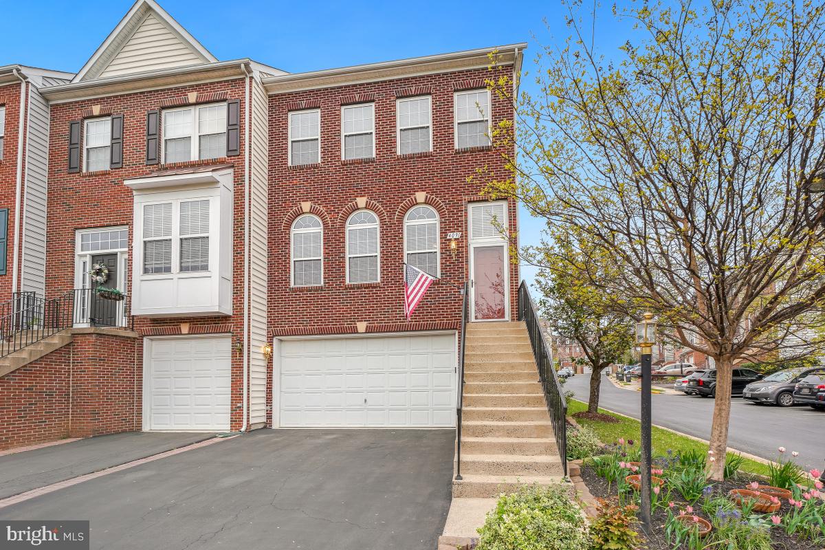 Welcome to this bright and beautiful end unit townhome with a 2 car garage in PRIME LOCATION! Over 2,500 finished sqft on 3 Levels w/gleaming hardwood flooring throughout the entire main level, staircases and upper level hallway. Tall ceilings and tons of windows make the living spaces nice and airy along with the open floor plan. The living room flows to the dining room through to the spacious kitchen making the perfect spaces for family gatherings. The kitchen features tons of cabinetry for storage and counter top space for meal prepping. A cozy family room extends off the kitchen w/custom built-ins and a warm gas fireplace! Also accessible from the kitchen area is the rear deck with privacy! The upper level houses 3BRs with recently upgraded carpeting and 2BAs with updated fixtures and lighting plus an upper level laundry closet with shelving! The primary suite is expansive with a large walk-in closet as well as a sitting area surrounded by windows with custom plantation shutters! The luxurious ensuite bathroom boasts a large soaking tub, an oversized dual sink vanity with updated fixtures and lighting as well as a separate walk-in shower! Completing this home is the fully finished basement with tons of natural light, upgraded wood flooring, fresh paint and a full bathroom! To top it off, this property is just minutes from the Fairfax Gov't Center, Fairfax Corner, Wegmans, Fair Lakes and easy access to I66 Express Lanes, Rt 50 & more! HVAC and Hot Water Heater replaced in 2024. This one is a must see!