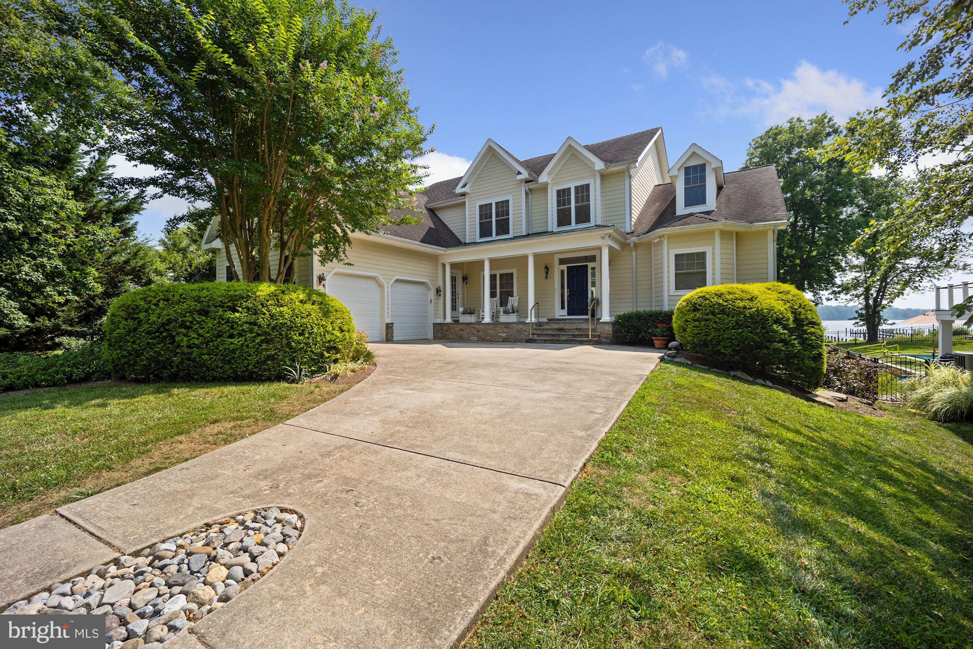 Below recommended list price for quick sale!!! Lovely  waterfront home on the Rhode River with over 5,500 square feet of living space on three levels!  Deep water dock, 5' MLW with 3 boat lifts. Southern exposure for fantastic sunsets from nearly every room, decks and saltwater pool. Open living room with wall of glass. Main level master, hardwood floors, solar panels and generator.  Total of 6 good sized bedrooms! Great space. Lovely deck overlooking  pool and river.  Huge walk out recreation room in lower level. Located on a very quiet peninsula just 45 minutes from DC. See virtual tour video. Improvements include: new HVAC in lower level, full interior painted, new pool cover, dock lights  installed, new water system upgrades, new generator, landscaping updates, TV and Sonos upgrades, alarm/security system installed, new washer/dryer, boat lift added to end of dock for 25ft boat, upgrade of one of existing lifts, upgrade of water supply to dock. Floors recently refinished