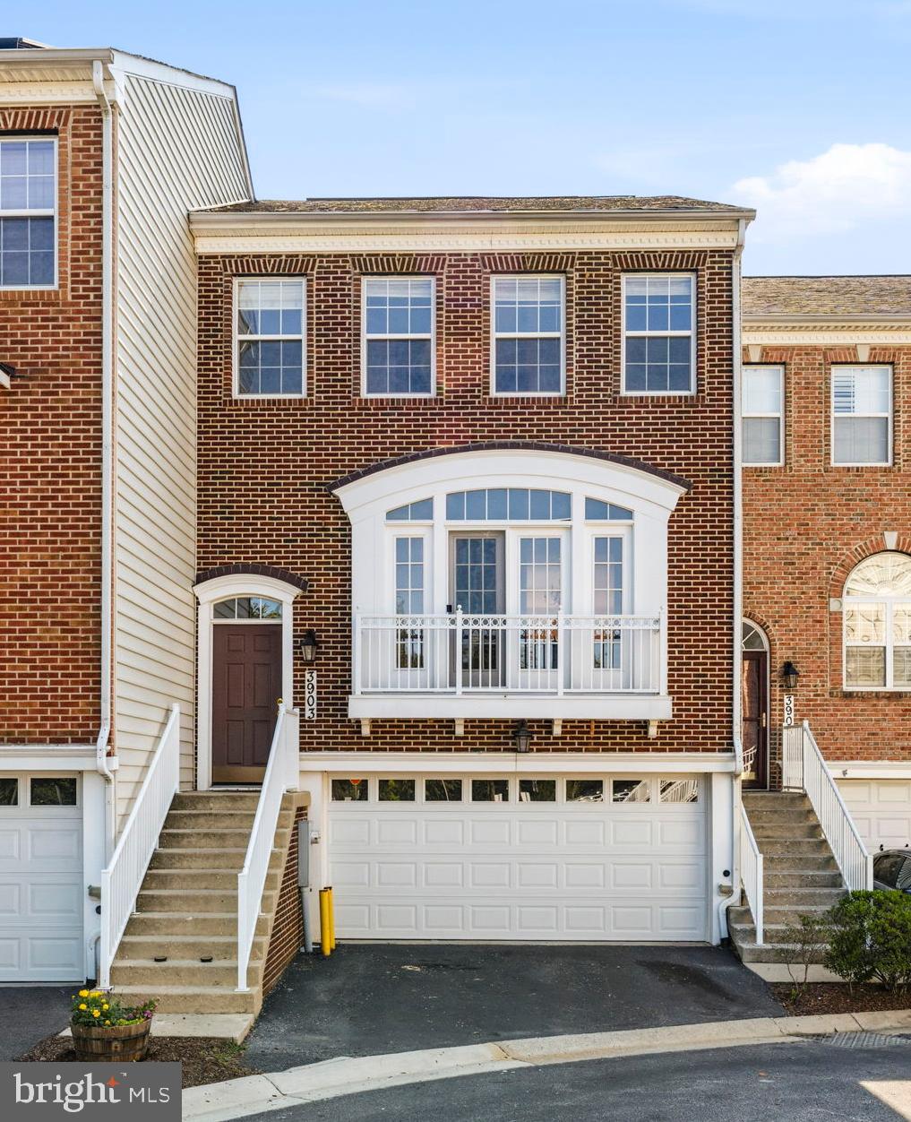 Conveniently located near major commuter routes, Metro access, and Martz commuter bus service, this luxurious townhouse offers the perfect blend of accessibility and comfort. Featuring 3 bedrooms, 2 full baths, and 2 half baths, the home provides more than enough space for everyday living and entertaining.

Enjoy peaceful views from two expansive rear decks overlooking a wooded backdrop, with the property backing directly to the forest conservation land and a scenic stream for added privacy and tranquility. Inside, the primary suite boasts vaulted ceilings, creating a bright and airy retreat. Recent updates include all-new carpet, freshly refinished  hardwood floors, and creamy white paint throughout that allows natural light to fill the home.

The lower-level living area features a cozy electric  fireplace, while the oversized two-car garage offer exceptional storage and convenience.