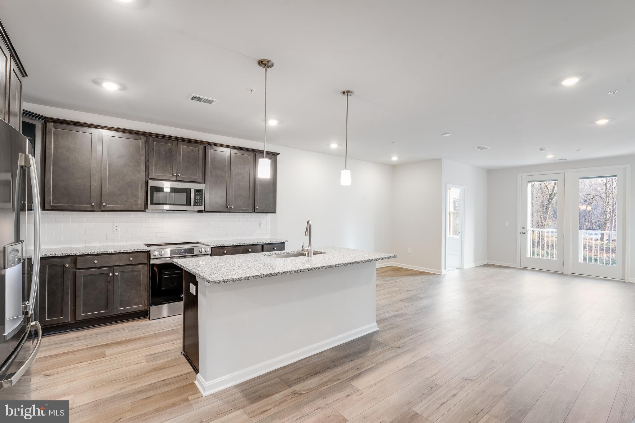 This 55+ Active Adult community is located in the Bowie area and designed with thoughtful elegance, resort-style living and convenience in mind. The Heritage at Beechfield will be an amenity-filled community featuring luxury elevator condominiums for those looking to enjoy an active lifestyle, without the maintenance. Relax and enjoy everything this charming community has to offer, in a premier location.

INCLUDED FEATURES:
-Elevator Condos
-Thoughtfully designed and appointed 1-3 Bedroom Style Residences
-Open Concept Living
-GE Stainless Steel Appliances
-Granite & Quartz Countertops
-Side by Side Washer & Dryer Included
-EVP Flooring
-Special Financing Rates & Closing Cost Assistance with use of Lennar Mortgage
-Garages and Storage Rooms Available
-Secure Building
-1, 2, 10 Builder Warranty
- Immediate Move In