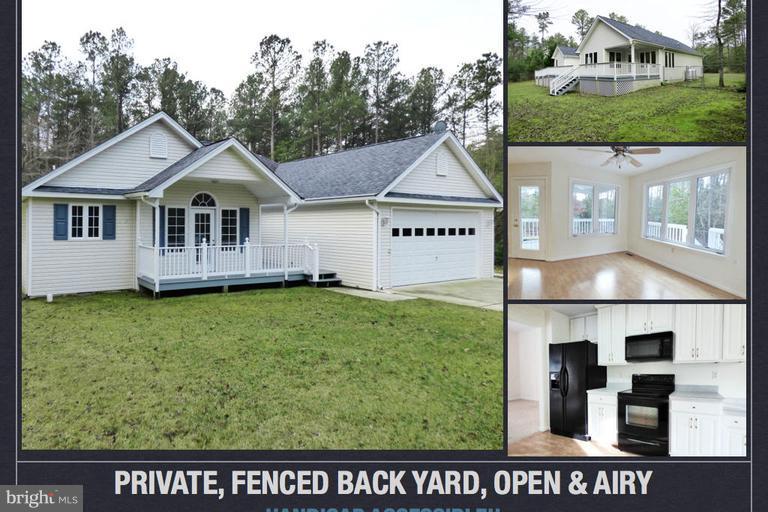 This home is ready to move into! Recently painted. Sits back off the road with private drive. Master bedroom has it's own porch. Large back deck runs the length of the house. Extra windows make this home bright open and airy. Master bathroom has 9X5 shower, fenced in back yard is great for a dog! Fully handicapped accessible complete with ramp from garage, sidewalk with ramp to back deck.