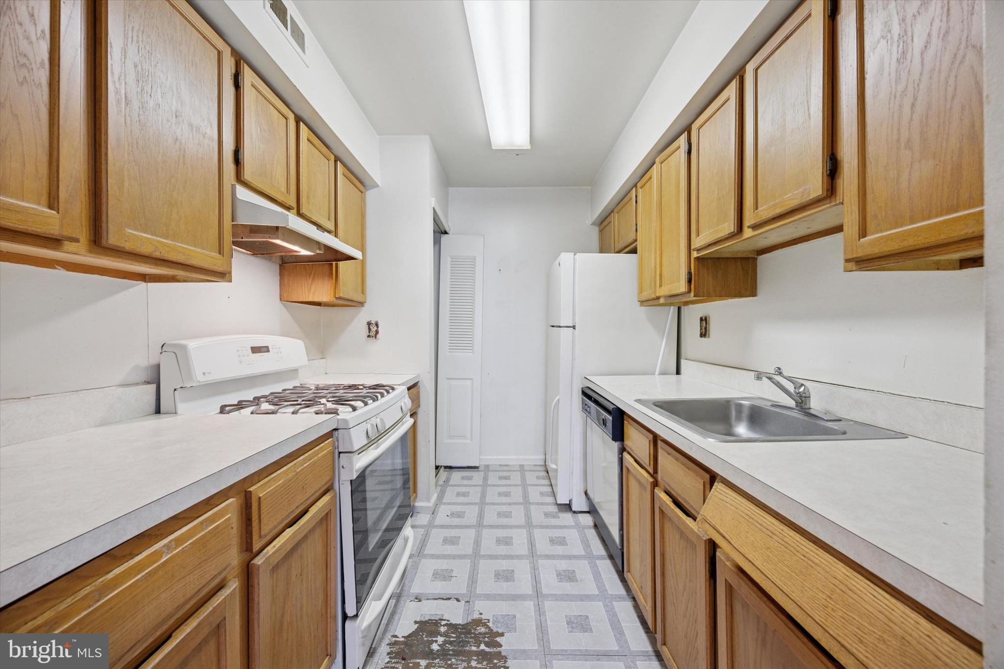 Exciting Opportunity to Create Your Dream Home! This 2-bedroom, 1.5-bath home in Red Lion Commons has great potential—it just needs your personal touch. Tucked away at the back of the building for added privacy and minimal noise, the unit is easily accessible via a walkway from the assigned parking space. The first floor features an open-concept living and dining area, along with a functional galley kitchen. A spacious storage area under the stairs provides ample room, making downsizing a breeze. Upstairs, you'll find two generously sized bedrooms with ample closet space, along with a large three-piece bathroom. The conveniently located washer and dryer sit just off the bath for easy access. Enjoy affordable living in a prime location—come take a look today!