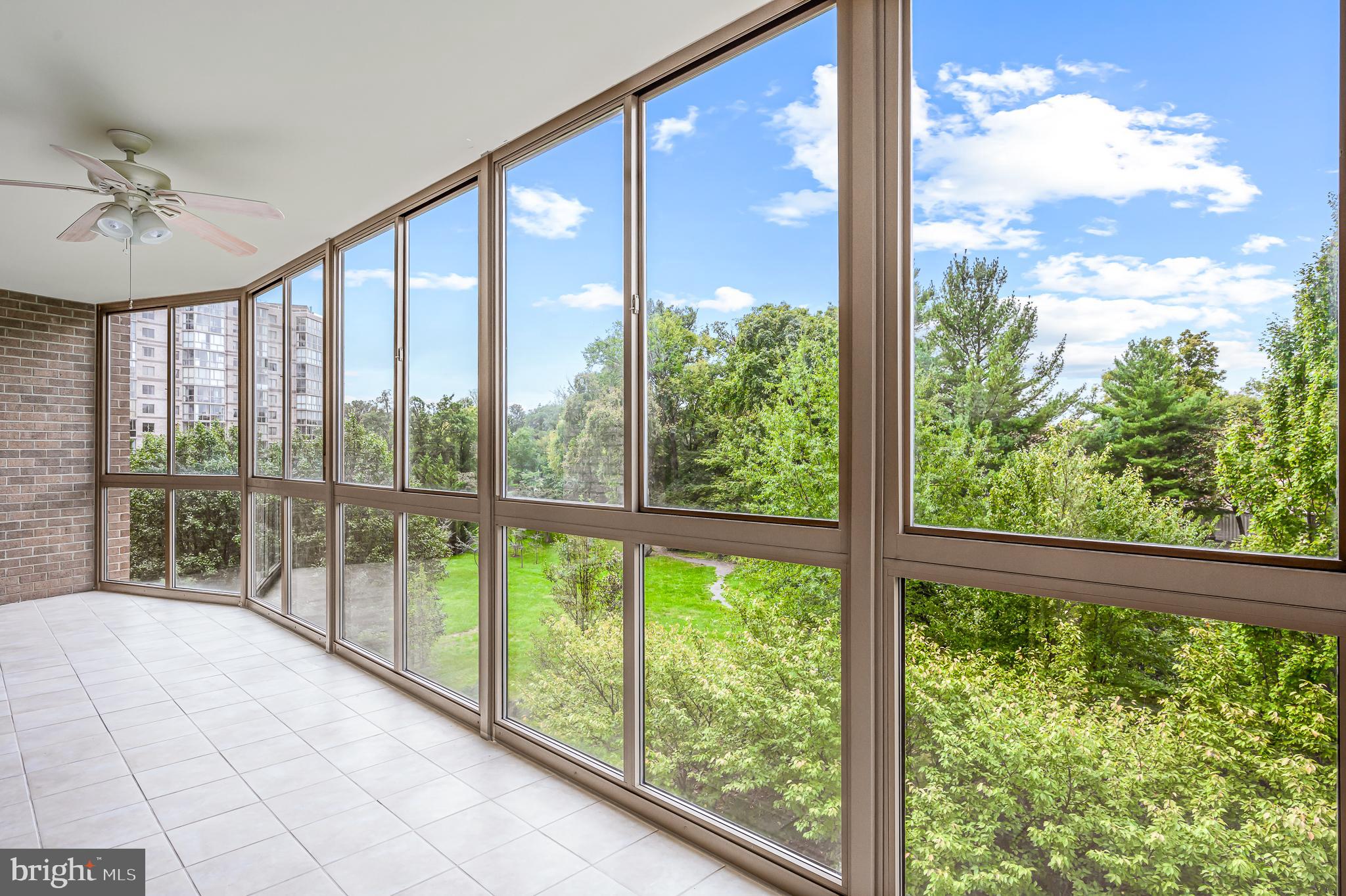 This gem is ready for a new owner!  The spacious glass enclosed patio is one of the largest in the community!. Welcome to 19355 Cypress Ridge Terrace, Unit 421, Leesburg, VA – where comfort meets style in this modern, spacious 2-bedroom, 2-bathroom condo with a cozy den that is ideal for a home office or reading nook.! With a generous 1509 square feet of living space, you'll have plenty of room to spread out and enjoy life.

Step inside to find a bright and airy open floor plan, accentuated by floor-to-ceiling windows that flood the space with natural light. The heart of the home is a spacious kitchen, perfect for culinary adventures, complete with ample storage, a dishwasher, microwave, disposal, and even an ice maker. 

This community offers a shuttle bus so you can park your car and enjoy  a free ride to grocery, shopping and more!  Great way to avoid traffic stress with easy pick up and drop off.

Relax in the expansive living area, or step out onto the large balcony (one of the largest in the community)  and take in serene views of the lush green space below. The primary suite offers a private oasis with an en-suite bathroom, while the second bedroom is equally inviting and served by a well-appointed hall bath.

This unit comes with a washer and dryer for ultimate convenience, and the building itself is packed with amenities to include a party room with regular activities and an outdoor space to gather with friends or relax.  A short stroll to the clubhouse allows you to  enjoy a dip in the indoor pool, break a sweat in the gym, challenge friends in the billiards or game room,  express your creativity in the art studio, woodworking shop or ceramics studio and then serve up some fun on the tennis court. 

Don't miss out on this vibrant, amenity-rich lifestyle – schedule your tour today!