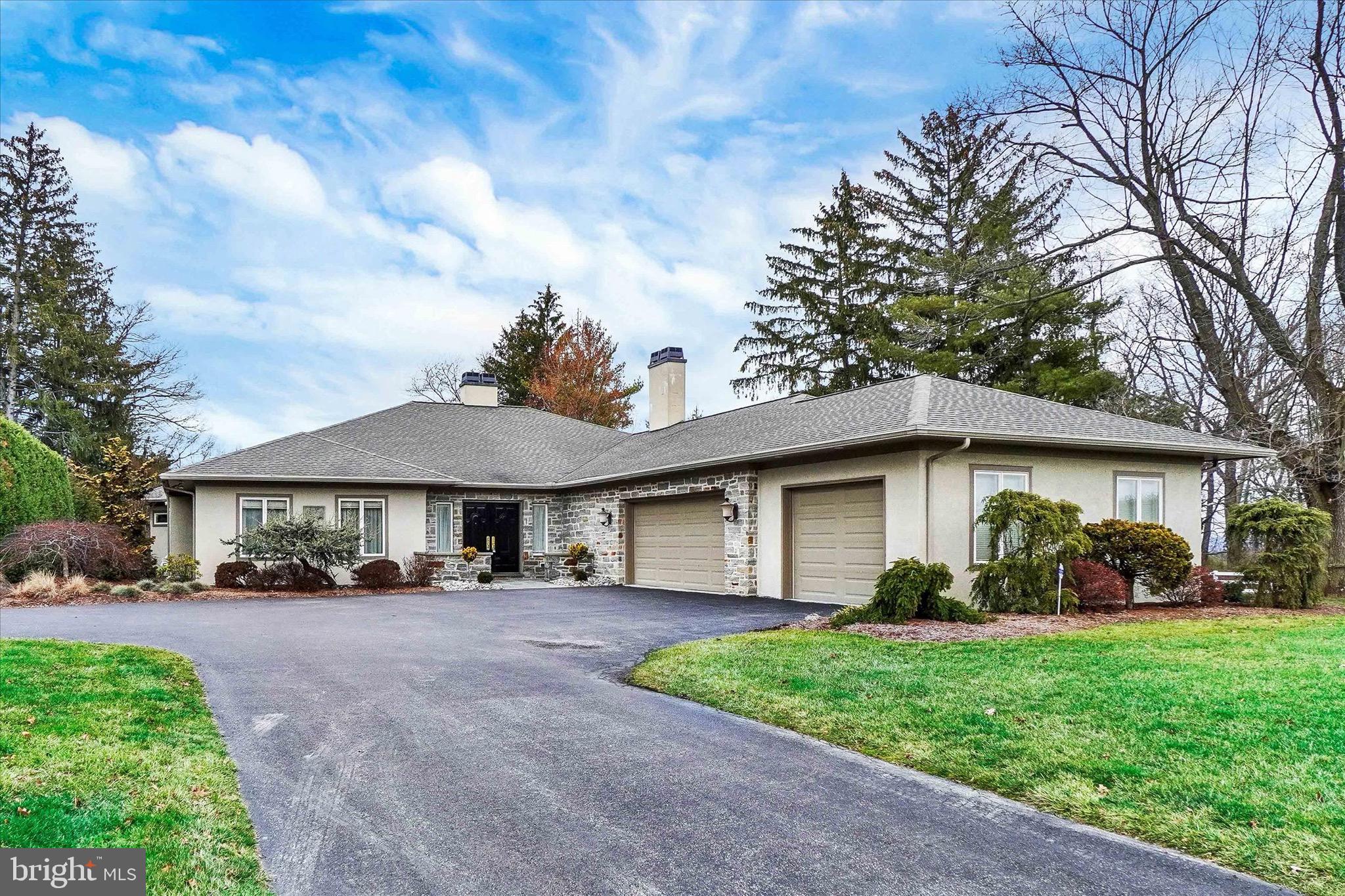 This distinctive, one of a kind, Executive Style Ranch home conveniently located  in one of York County's most sought after locations, is being offered for the first time since it was completely transformed into the absolute gem you see today. Boasting over 4500 square feet of living space on one level, this home exudes  quality of design and craftmanship at every turn. You'll not have another opportunity such as this. Just a few highlights include the expertly designed , spacious and simply gorgeous kitchen with large center island, thoughtful built ins, gracious granite counter tops, double ovens, large walk in pantry, and so many little details you'll discover upon inspection. The simply stunning great room with it's soaring cathedral wood ceiling, custom built in cabinetry, wet bar, fireplace, rich hardwood flooring and, hidden large screen TV is unlike any other. Of course there's a wonderfully designed owner's suite with a King and Queen bathroom with heated floor for your chilly feet  to enjoy. An elegant office or additional bedroom sits off the kitchen area and has custom rich built ins and a fireplace.  Large living room with hardwood floors, fireplace and custom area rug.  Other fine features include an elevator to access the lower level game room, a whole house back up generator, rich hardwood flooring thru out the main living space, an oversized 3 car garage with extra storage, a private patio area off the kitchen, a private deck and screened porch off the great room, a finished rec/game room  with fireplace in lower level plus a  large unfinished basement area for even more storage,. There are 3 distinct heating and cooling units, and custom storage closets thru out this beautifully designed home. Did I mention that all window blinds can be controlled remotely and set to go up or down at anytime of day? Very cool indeed.  On the outside, a circular drive, extensive landscaping everywhere, and a very private rear yard area are yours to enjoy. There are many other fine features to this home you'll discover upon closer inspection and all are sure to please. In short, this home is truly a masterpiece of timeless design and  quality materials and craftmanship  that you'll be most proud to call your home.