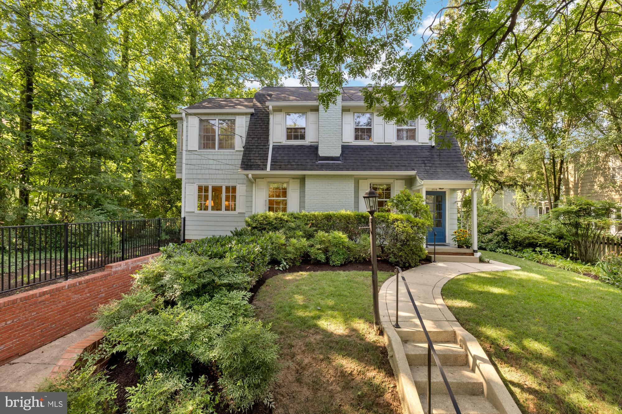 Open House CANCELLED! We are Under Contract!  Welcome to this quintessential Dutch colonial nestled in the sought-after Martin's Addition neighborhood of Chevy Chase. Timeless curb appeal, a spacious floor plan, and updates throughout, this 4 bedroom 3 bath home offers the perfect blend of character, comfort, and convenience. Step inside to find warm hardwood floors, generous natural light, and thoughtfully designed living spaces. The formal living room features a cozy wood-burning fireplace, while the separate dining room is perfect for hosting family gatherings and dinner parties. The dining room opens to the patio, creating seamless indoor-outdoor living. The spacious family room is drenched in sunlight from 3 directions, and can also be used as home office or guest room with attached full bath. The bright, updated kitchen includes abundant cabinetry and a breakfast bar that opens to a sunny and cheerful breakfast room. An enormous skylight illuminaes the space, which overlooks the private backyard—ideal for morning coffee or casual meals. Upstairs, you'll find four spacious bedrooms, including a serene primary suite with vaulted ceilings, en-suite bath and plenty of closet space. Outside, enjoy a professionally landscaped yard, mature trees, and a quiet street perfect for evening walks. Don’t miss this extraordinary opportunity to live in this special neighborhood. Steps to the organic farmer’s market, the Shops at Brookville, the popular restaurant La Ferme, Shepherd Park and playground and the highly-regarded CCUMC Preschool, which serves as a feeder to the award-winning Chevy Chase public school cluster. Walkability, quiet setting, and eligibility for membership in the popular Chevy Chase Recreation Association Swim and Tennis Club (CCRA), make this home a smart choice for today’s homebuyer. Whether you're looking for a place to grow, entertain, or simply relax, this home checks all the boxes.
