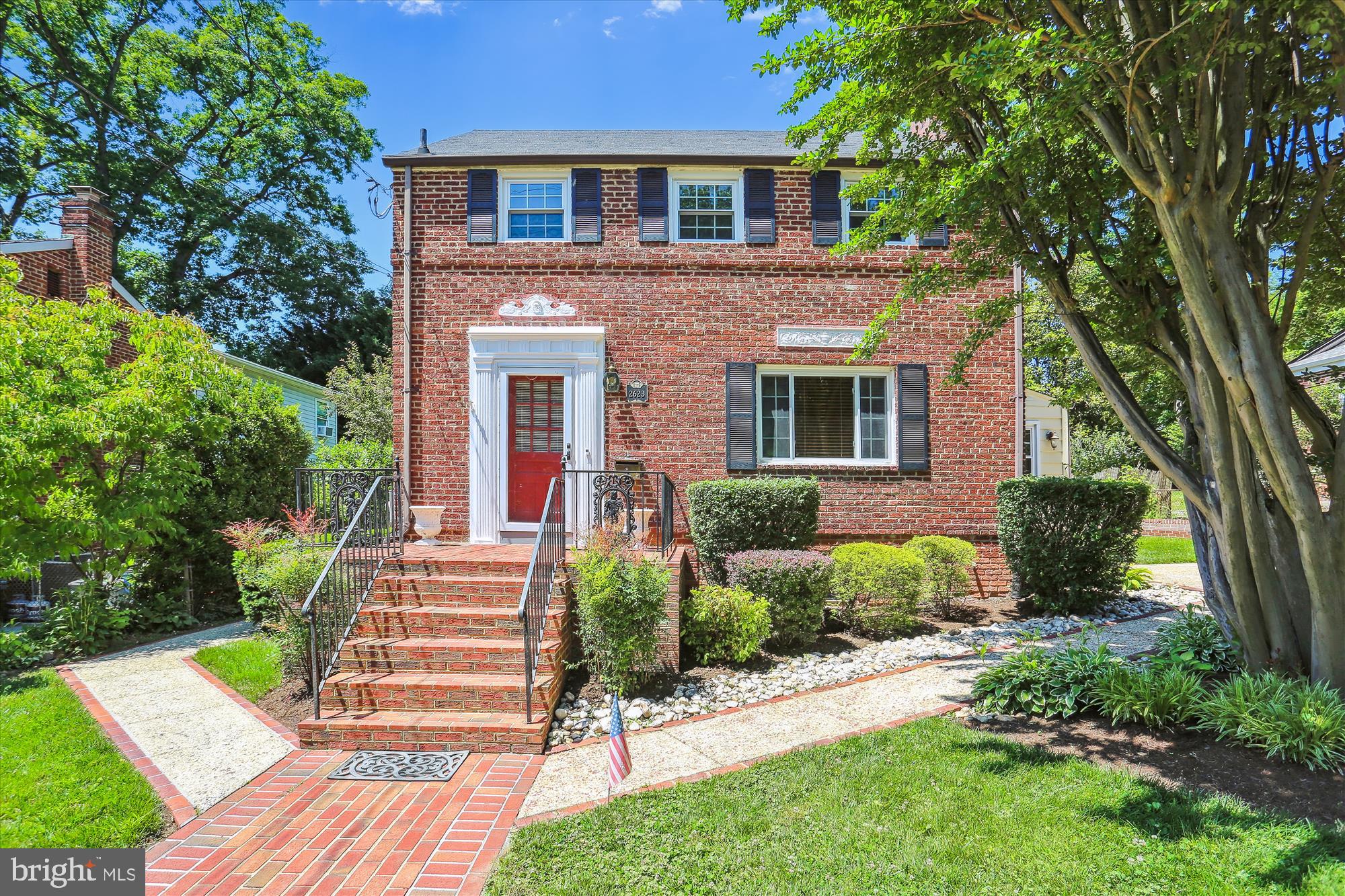 THIS LOVELYPROPERTY IS LOCATED ON A QUIET AND BUFFERED SERVICE ROAD AND IS NOT EXPOSED DIRECTLY TO E.W. HWY.  This Classic Brick Chevy Chase ColoniaL 3 BR 2.5 Bath home features a large eat in Kitchen addition, Formal living room with Fireplace and Crown mouldings,  finished basement, Off street parking for 2 cars, and spectacular landscaping.