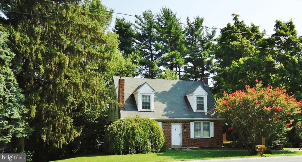 PRICED TO SELL! Sellers relocating, available immediately. Charming home on .34 acre. Huge deck and screened porch, lots of hardwoods, 2 fireplaces. Formal living room with French Doors to deck and built-in shelving. Formal dining room with built-in corner cabinet. One car garage with lots of parking.