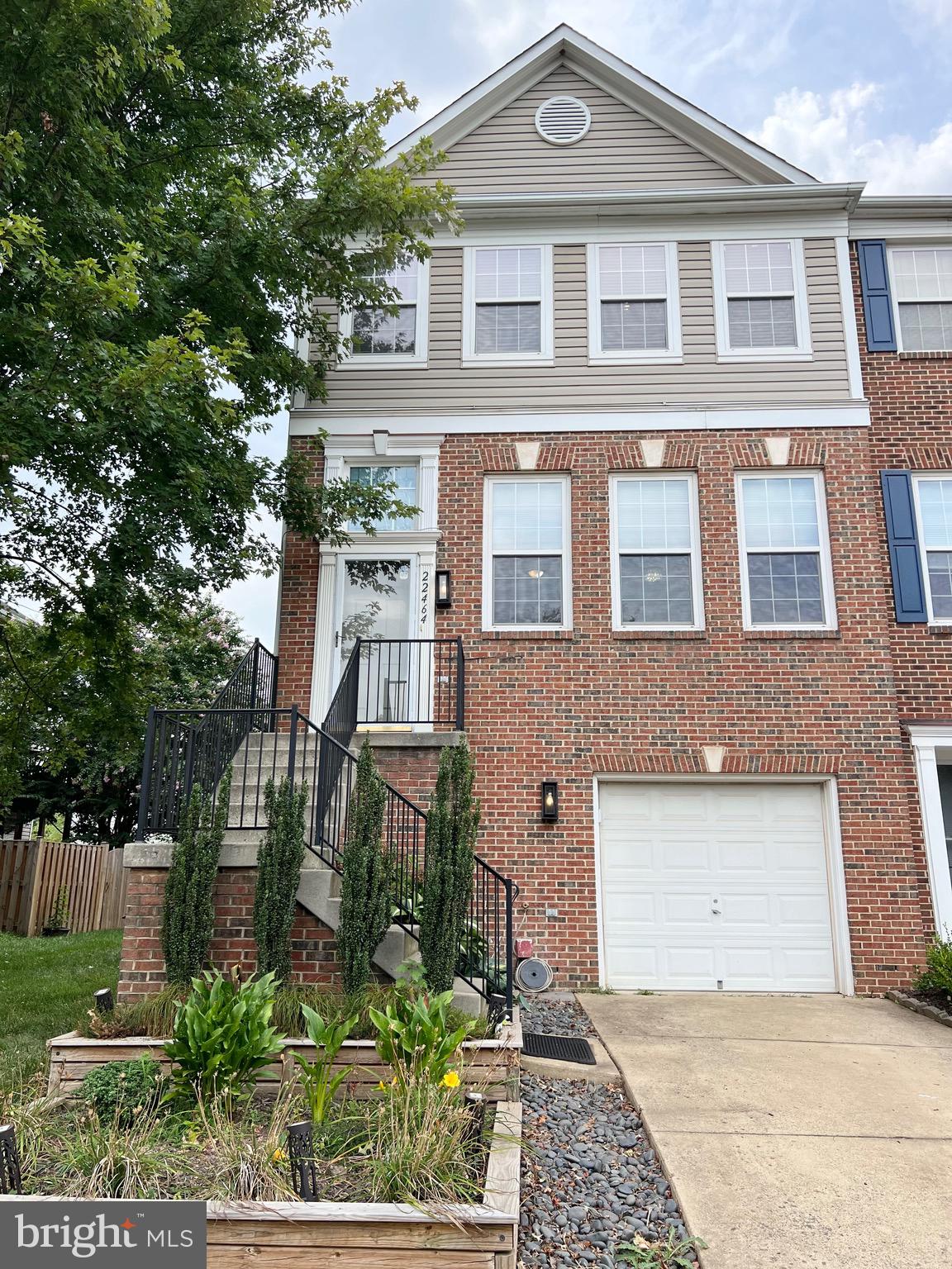 Welcome to this stunning east-facing brick end-unit townhome, ideally located on a spacious, fenced corner lot. Spanning three levels, this beautifully maintained home features 3 bedrooms, 3.5 baths, and a large deck, perfect for both relaxation and entertaining.

Inside, you'll find a spacious living and dining area that flows into a modern kitchen with granite countertops and stainless steel appliances. The kitchen offers easy access to the deck, where you can soak in the morning sun.

The upper level features a master suite with vaulted ceilings, a large walk-in closet, and an en-suite bath. Two additional bedrooms share an upgraded bathroom, providing ample space for family or guests. The fully finished lower level includes a versatile recreation room, a full bath, and walkout access to a stone-paved patio and a generous backyard.

This home is conveniently located just minutes from major routes like the Dulles Toll Road, Dulles Airport, and the new Ashburn Metro Station. Enjoy nearby shopping and dining at Brambleton Town Center and One Loudoun.

Don't miss out on this rare opportunity to rent a beautifully updated, east-facing end-unit townhome in a prime location!