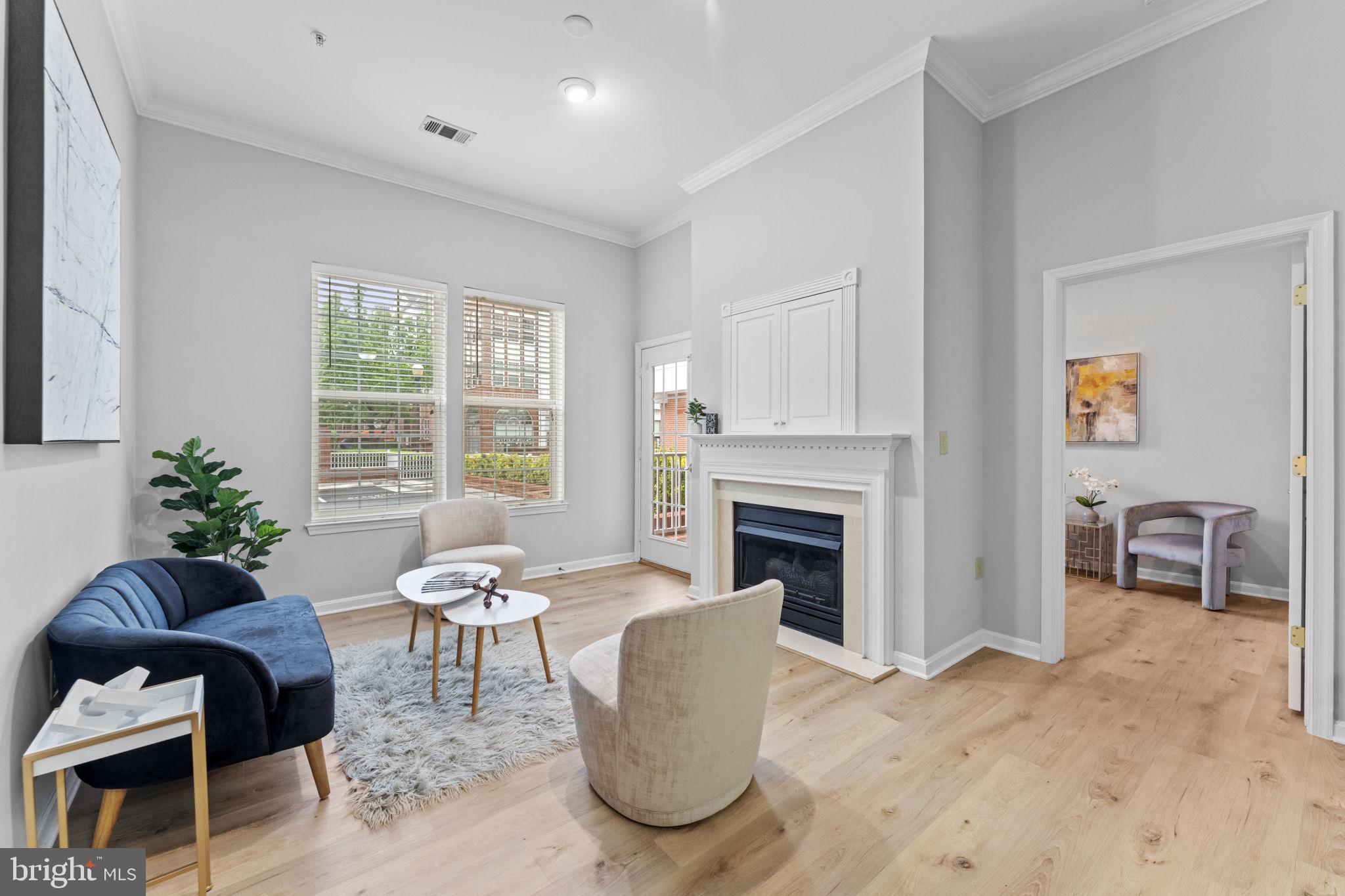 Offer Deadline, Sunday, May 18th 2:00pm 
Welcome to the highly sought-after Cameron Station community! This rare 1-bedroom + spacious den condo offers 1.5 baths, soaring 10-foot ceilings, and an abundance of natural light. Thoughtfully updated, it features brand-new stainless steel appliances, beautiful hard floors throughout, and an oversized washer and dryer for added convenience.

The open-concept living area seamlessly flows into a versatile den—ideal as a home office, guest room, or cozy reading nook. Enjoy secure underground garage parking, access to a well-equipped fitness center, and a community pool. The neighborhood offers unbeatable convenience with onsite retail, restaurants, a coffee shop, daycare, dentist, dry cleaners, and more—all just steps from your door.

Pet lovers will appreciate two fenced-in dog parks, while commuters will love the shuttle service to Van Dorn Metro. Ideally located across from scenic Brenman Park—with its walking trails, lake, and year-round farmers market—this home offers urban convenience in a tranquil, park-like setting. All just minutes from Old Town Alexandria, D.C., and major commuter routes. Truly the best of both worlds!