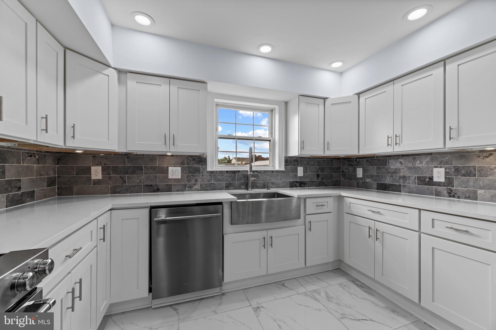 Welcome to this beautifully renovated 4-bedroom, 3 full bath, 2 half bath home in Pasadena's sought-after Sunset Beach waterfront community. Completely remodeled in 2026, this move-in ready home combines modern finishes with the Chesapeake Bay lifestyle buyers are looking for. Enjoy water views from the charming front porch and the spacious primary suite, which features a walk-in closet and beautifully updated private bath. The open-concept main level showcases a stunning kitchen with quartz countertops, farmhouse sink, stainless steel appliances, and seamless flow into the living and dining spaces. The fully finished basement offers additional living space, a half bath, abundant natural light, and plenty of storage. Outside, the large fenced backyard provides room to relax, entertain, or play. Enjoy access to the community pier and boat ramp, beach access, parks, and playgrounds, making it easy to enjoy life on the water. As an added bonus, the seller is offering a Seller-Paid 2-1 Buydown, providing qualified buyers with reduced monthly payments during the first two years of homeownership. This could bring your interest rates  to 3.99%  Modern updates, water views, community amenities, and an attractive financing incentive this home truly has it all.