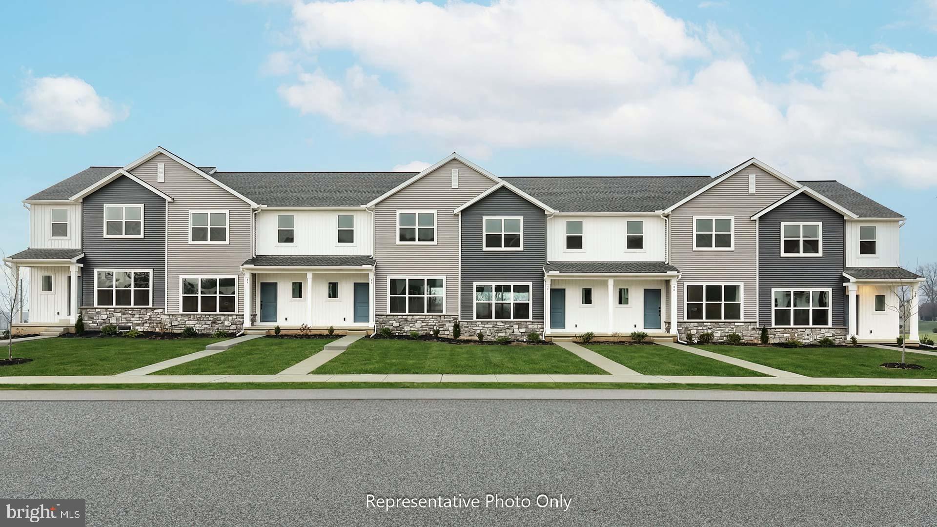This comfortable 2-story townhome includes a 1-car, rear load garage, partially finished basement, and a composite deck. Stylish vinyl plank flooring flows throughout the first floor. The sunny family room opens to the kitchen and dining area. The kitchen is well-appointed with stainless steel appliances and quartz countertops. On the second floor, the owner’s suite features an expansive closet and a private bathroom. Adjacent to the suite are two additional bedrooms, a full bathroom, and a laundry closet.