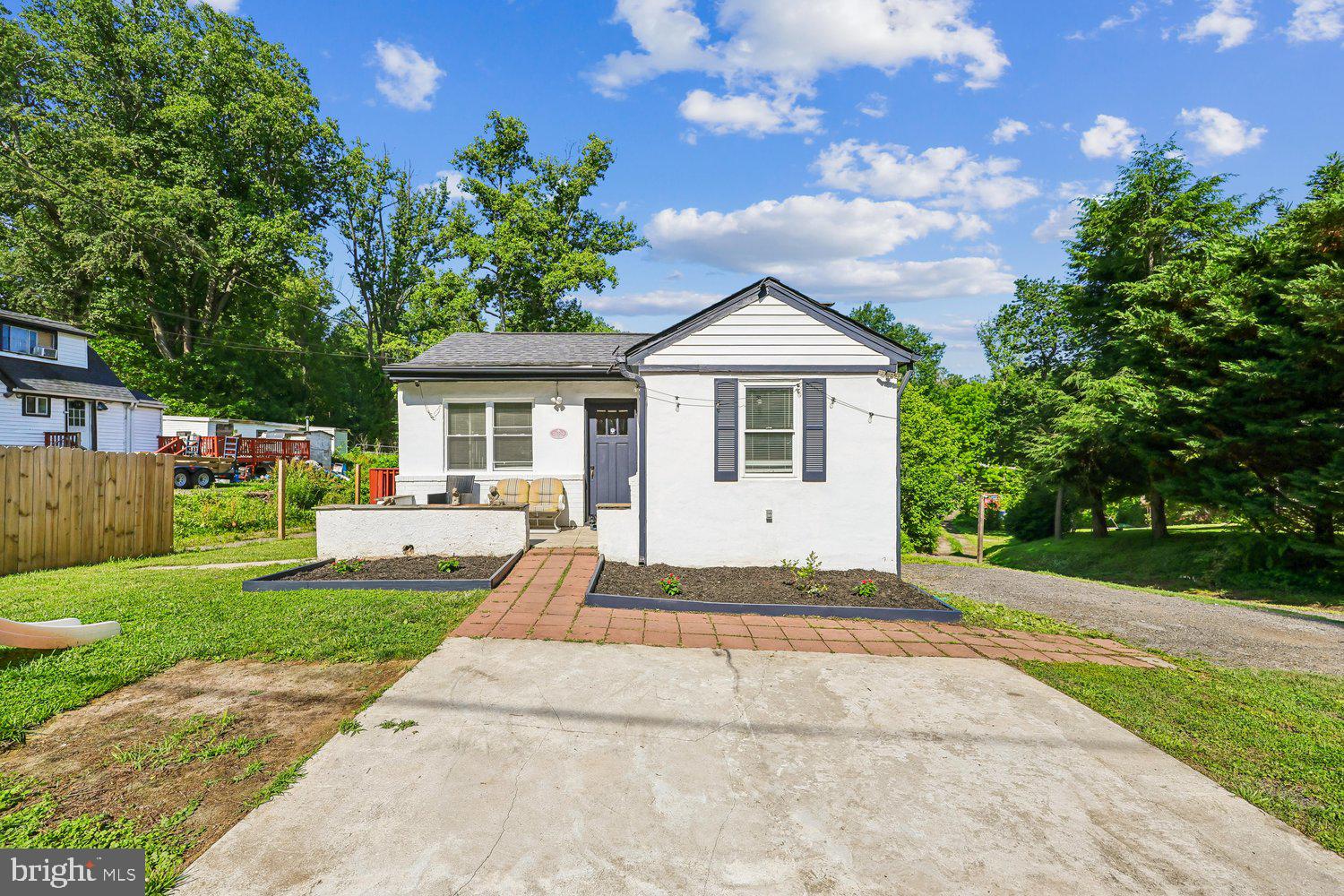 Welcome to this well-maintained single-family home offering numerous recent updates and a peaceful country setting. This property features 3 bedrooms, 1.5 bathrooms, and a finished lower level with a convenient kitchenette, providing additional flexibility for everyday living.

Recent improvements include a new well (2022), HVAC system (2022) , water heater (2022), remodeled bathrooms (2024), and a garage roof replaced in 2023. The main level and bedrooms feature engineered flooring, while the hallway showcases hardwood flooring. The kitchen includes a stainless steel refrigerator and white electric range.

Additional features include recessed lighting throughout the main level, ceiling fans with light fixtures, a spacious deep garage, and a neighboring driveway easement.

Don't miss this opportunity to own a home with many valuable updates in a desirable country setting. Schedule your private tour today! Should you have any questions feel free to reach out the listing agent.