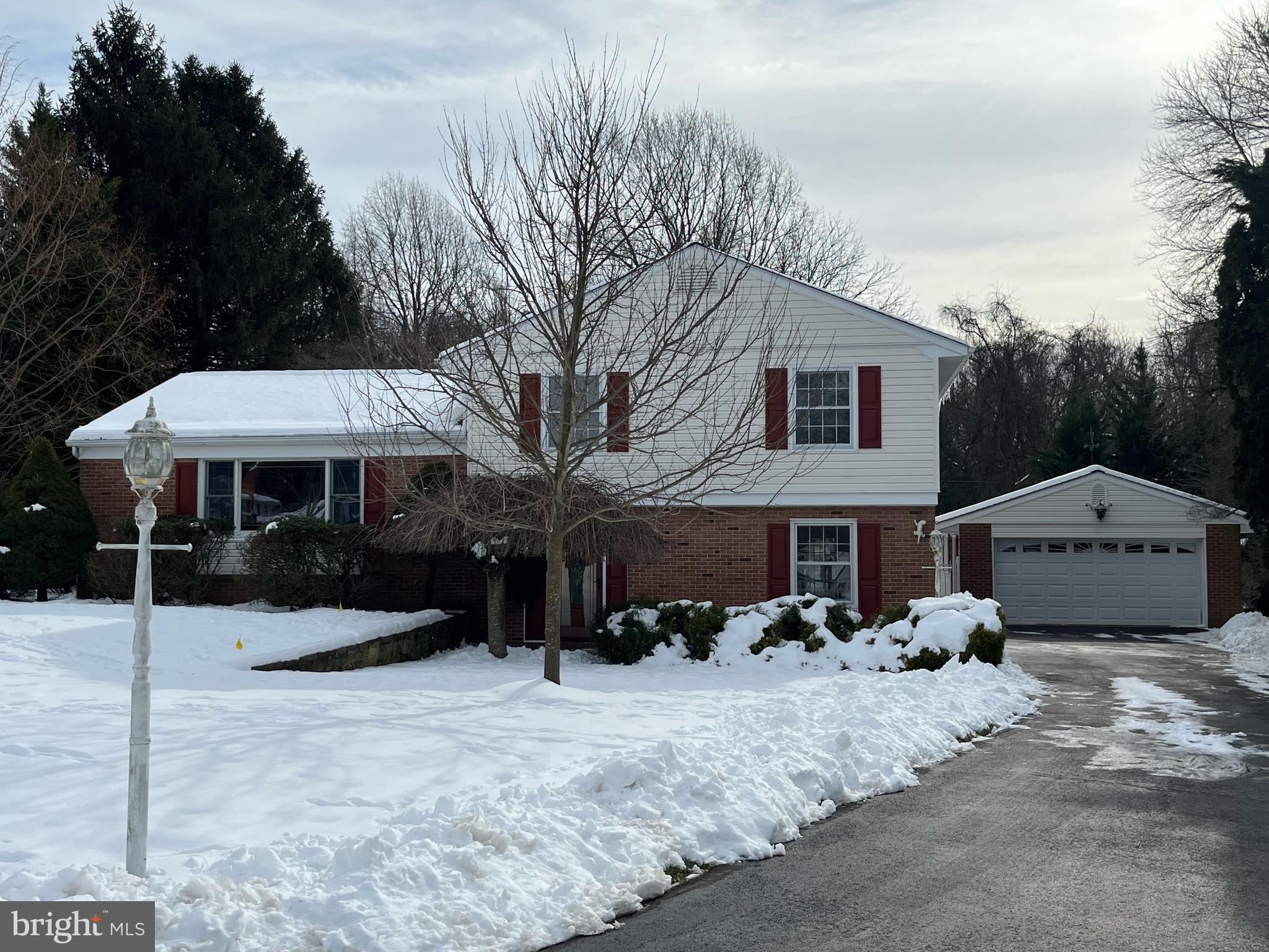 This spacious, single family home is situated on a peaceful dead end street & ultra convenient to countless area parks & amenities + has easy access to commuter routes. Longing for your own 1/2 + acre for gardens, play area, pets...?  This Columbia Hills gem is a must see - 4 levels for everyone to spread out includes: a large  entry level family room; a rear sunporch; formal living & dining rooms with hardwood flooring; an updated kitchen; 3 upper level bedrooms & 2 updated baths; an unfinished walk up basement with full sized laundry & great space for storage, workshop, projects, & hobbies. Wait, there's more... your very own detached 2 car garage with extended back area for even more storage & work space; a relaxing deck & a secure garden shed in the tranquil rear yard. Roof was replaced 2021; gas water heater new 10/2020.